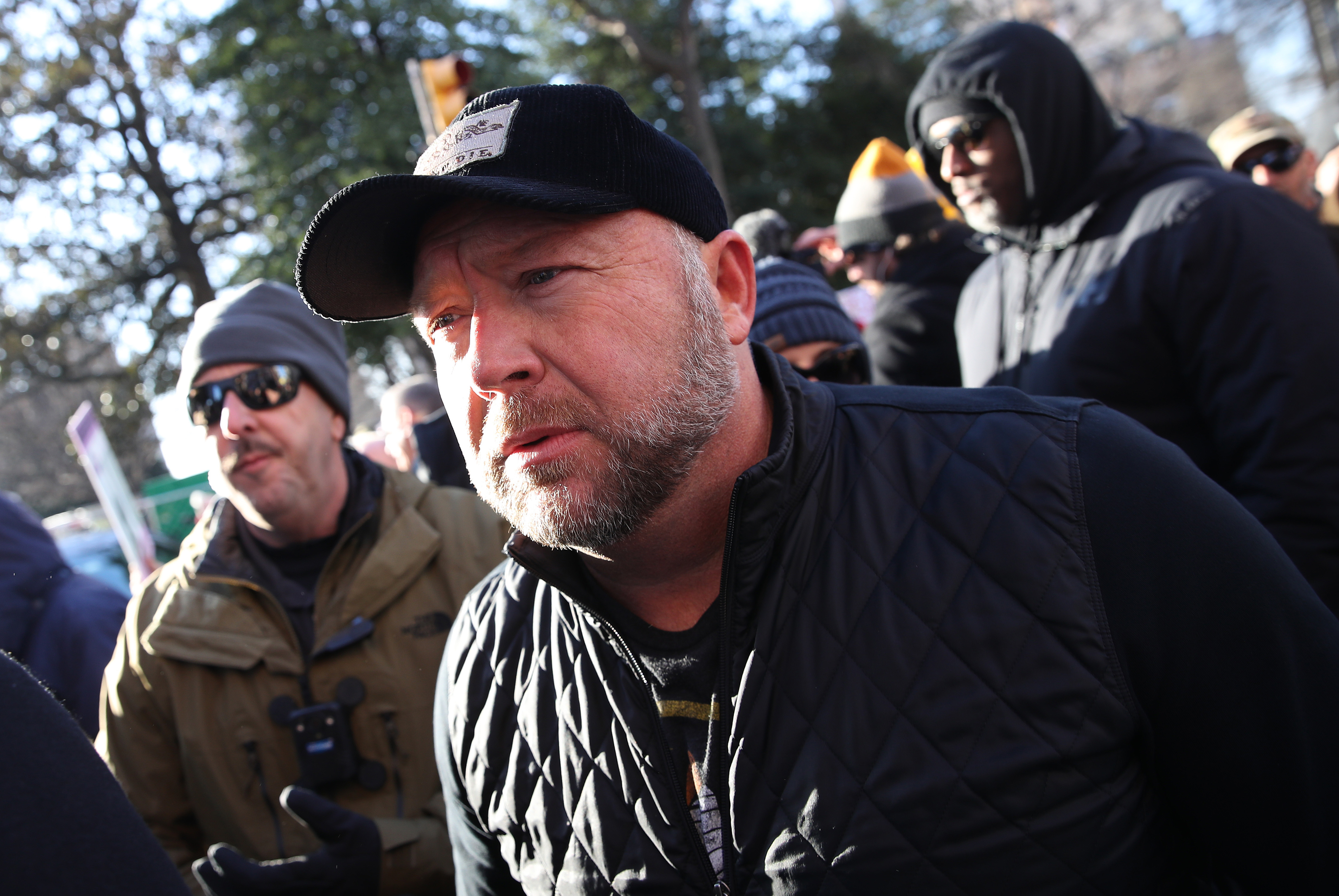Alex Jones joins thousands of gun rights advocates attending a rally organized by The Virginia Citizens Defense League on Capitol Square near the state capitol building on January 20, 2020, in Richmond, Virginia. | Source: Getty Images