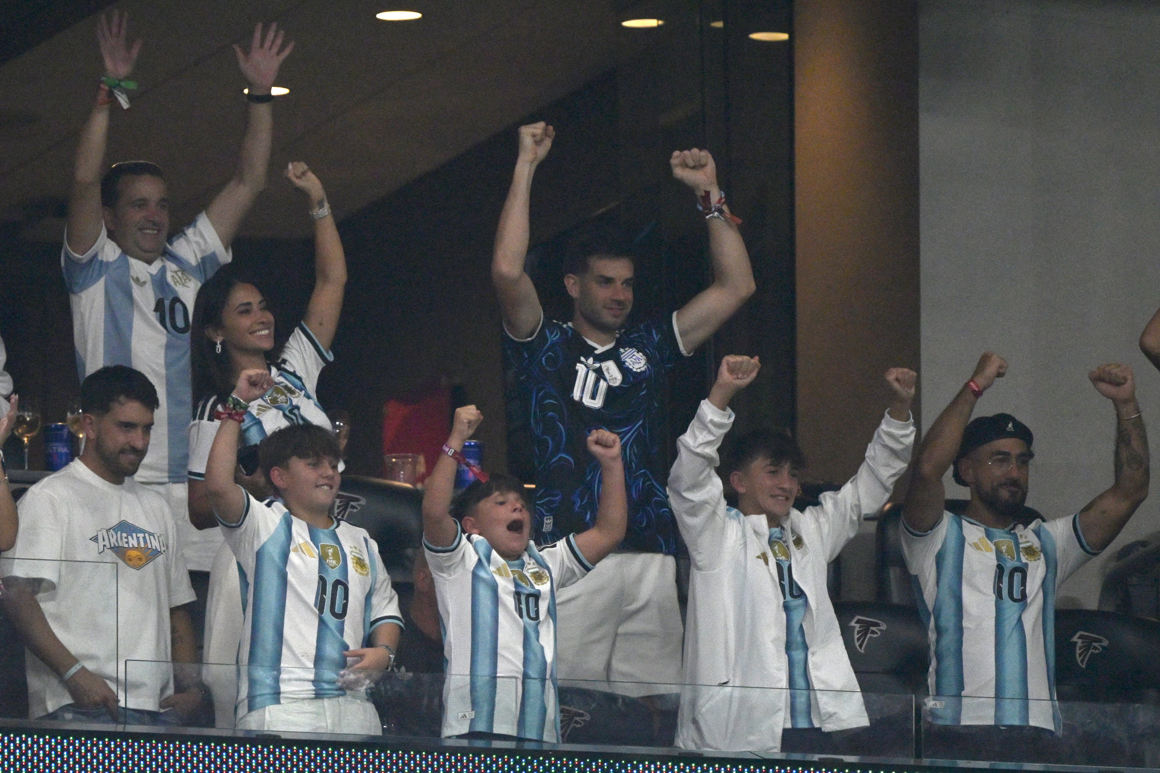 Antonela Roccuzzo and her sons Mateo and Thiago cheered on Lionel Messi from the stands as they celebrated at the end of the World Cup semi-final match between England and Argentina at Atlanta Stadium on July 15, 2026, in Atlanta, Georgia. | Source: Getty Images