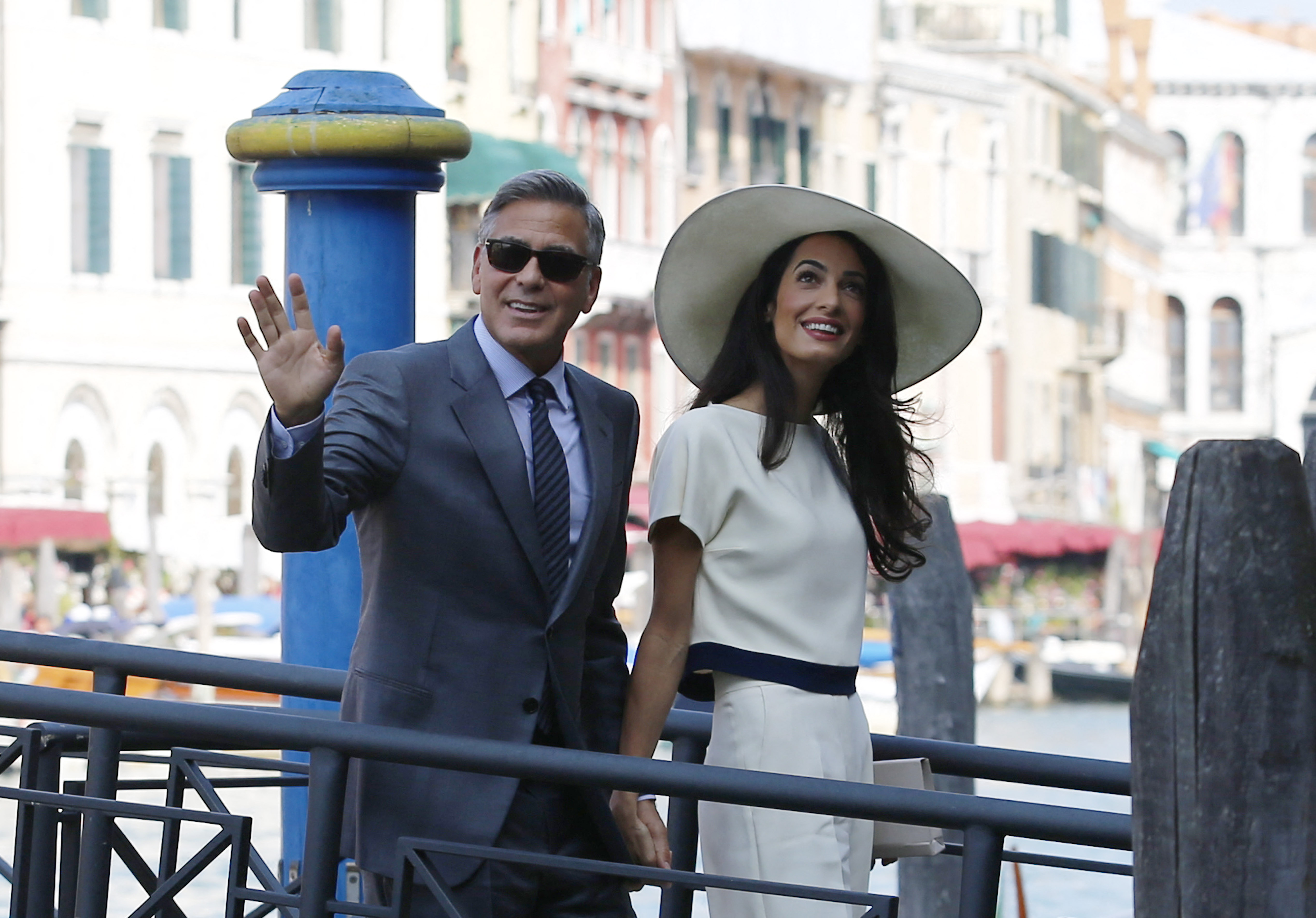 George Clooney and Amal Alamuddin arrive at the palazzo Ca Farsetti on September 29, 2014 in Venice. | Source: Getty Images