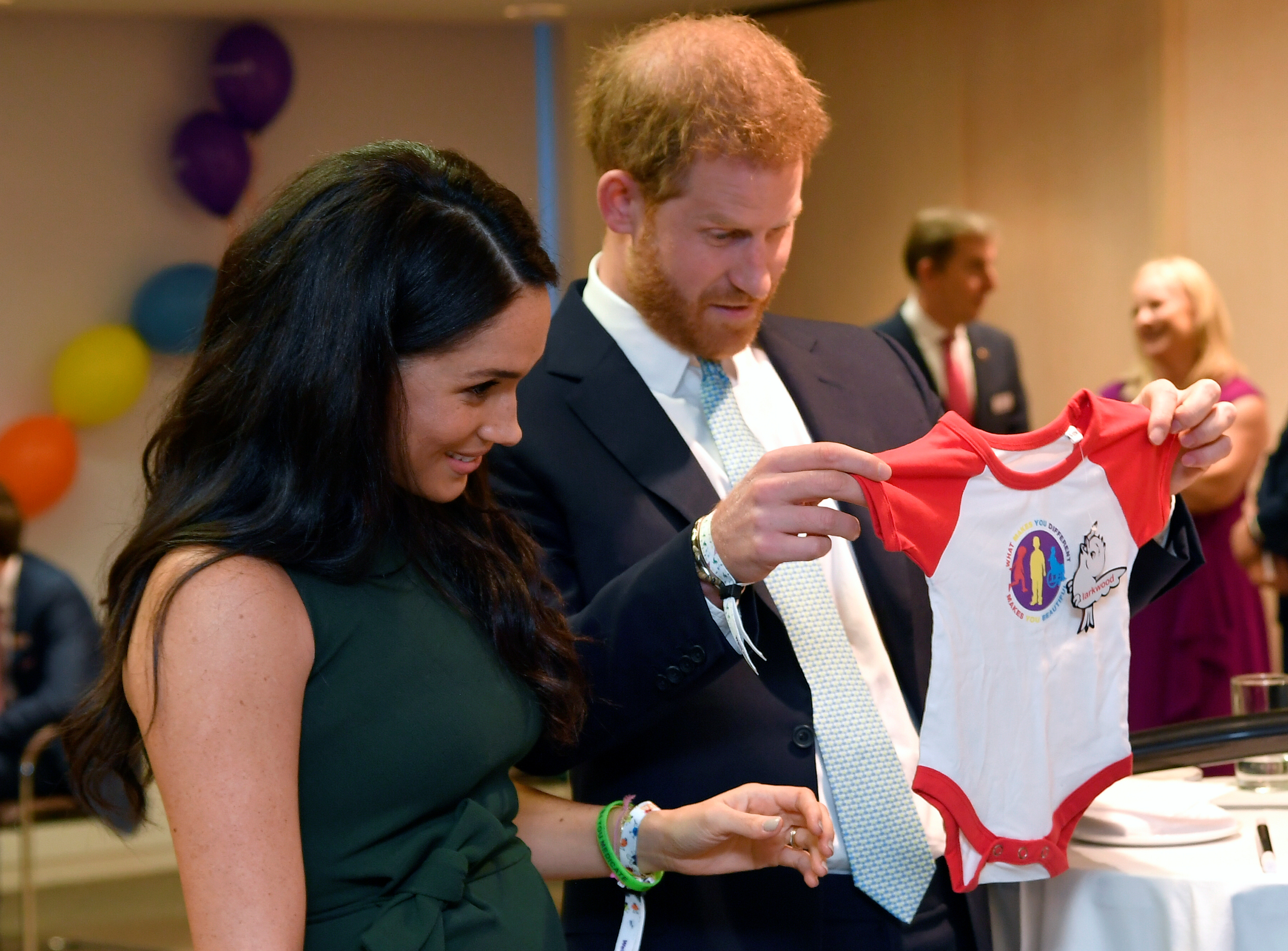 Prince Harry and Meghan Markle view a gift for their son Archie on October 15, 2019, in London, England | Source: Getty Images