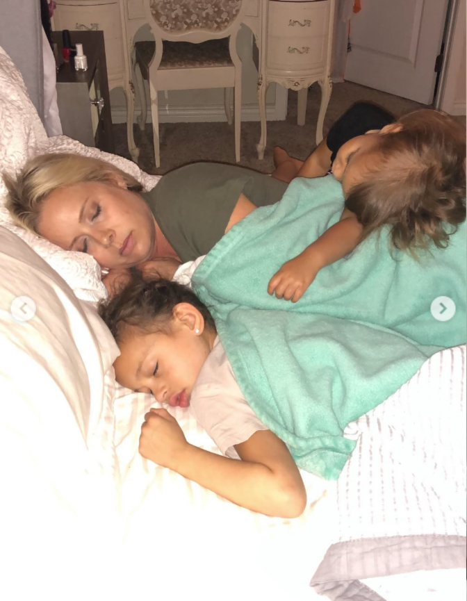 Criscilla Anderson with her children are asleep on a bed, as seen from a post dated December 3, 2025. | Source: Insgtagram/criscilla