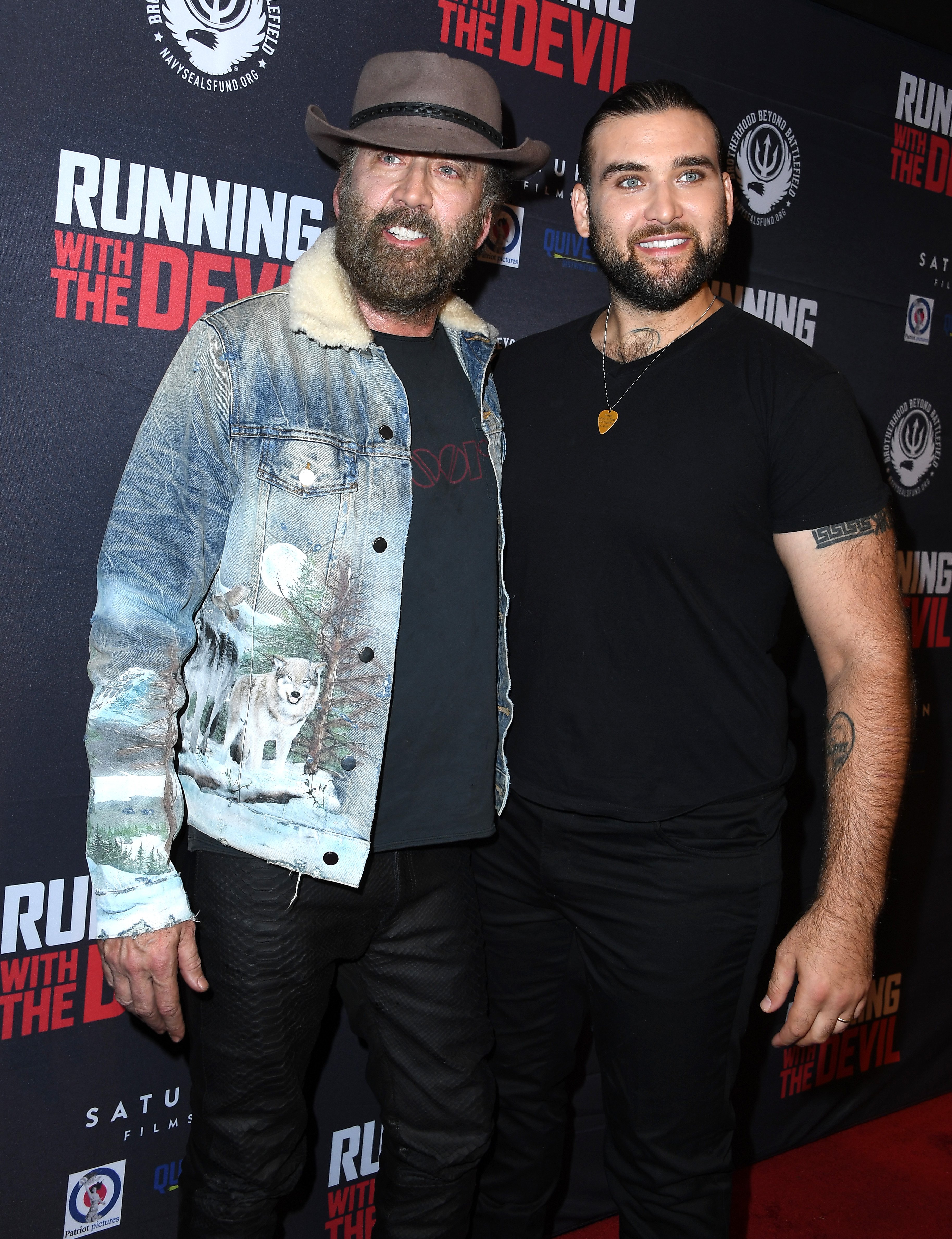 Nicolas Cage and son Weston Coppola Cage arrives at the Premiere Of Quiver Distribution's "Running With The Devil" at Writers Guild Theater on September 16, 2019 in Beverly Hills, California | Source: Getty Images 
