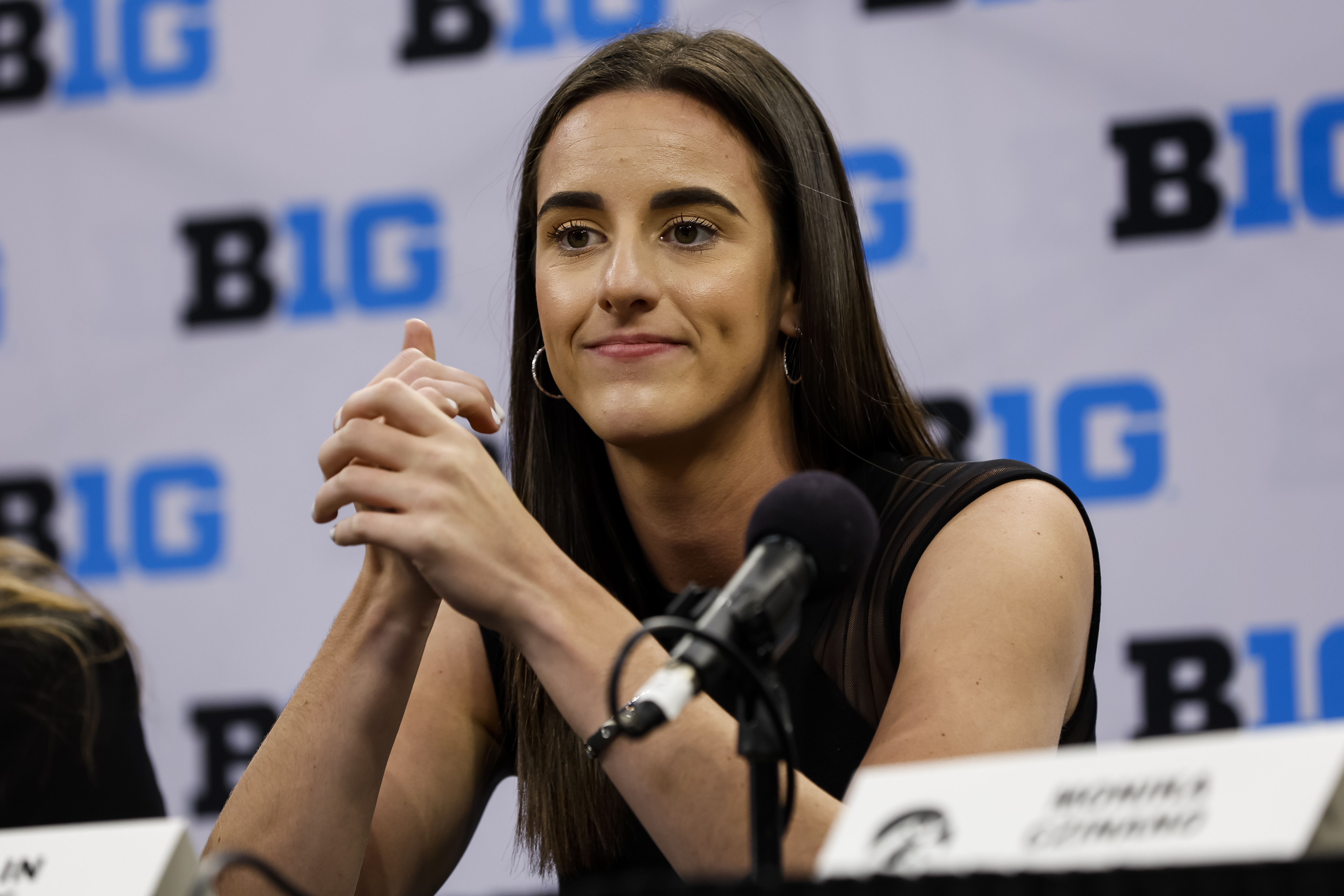 Caitlin Clark of the Iowa Hawkeyes speaks to media during Big Ten Media Days at Target Center in Minneapolis, Minnesota, on October 11, 2022. | Source: Getty Images