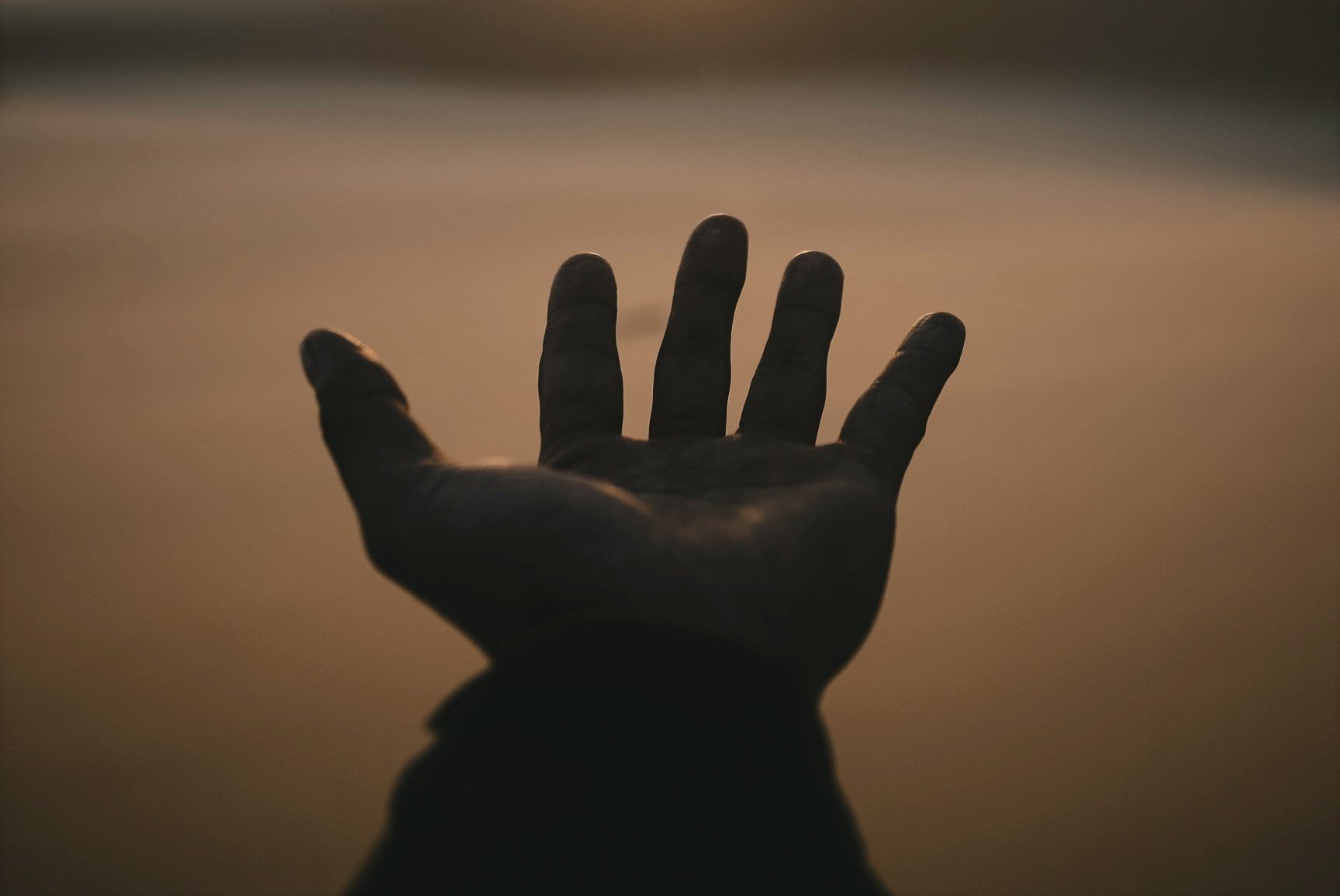 "Do you have any spare change? Just enough for a cup of coffee?" | Source: Unsplash