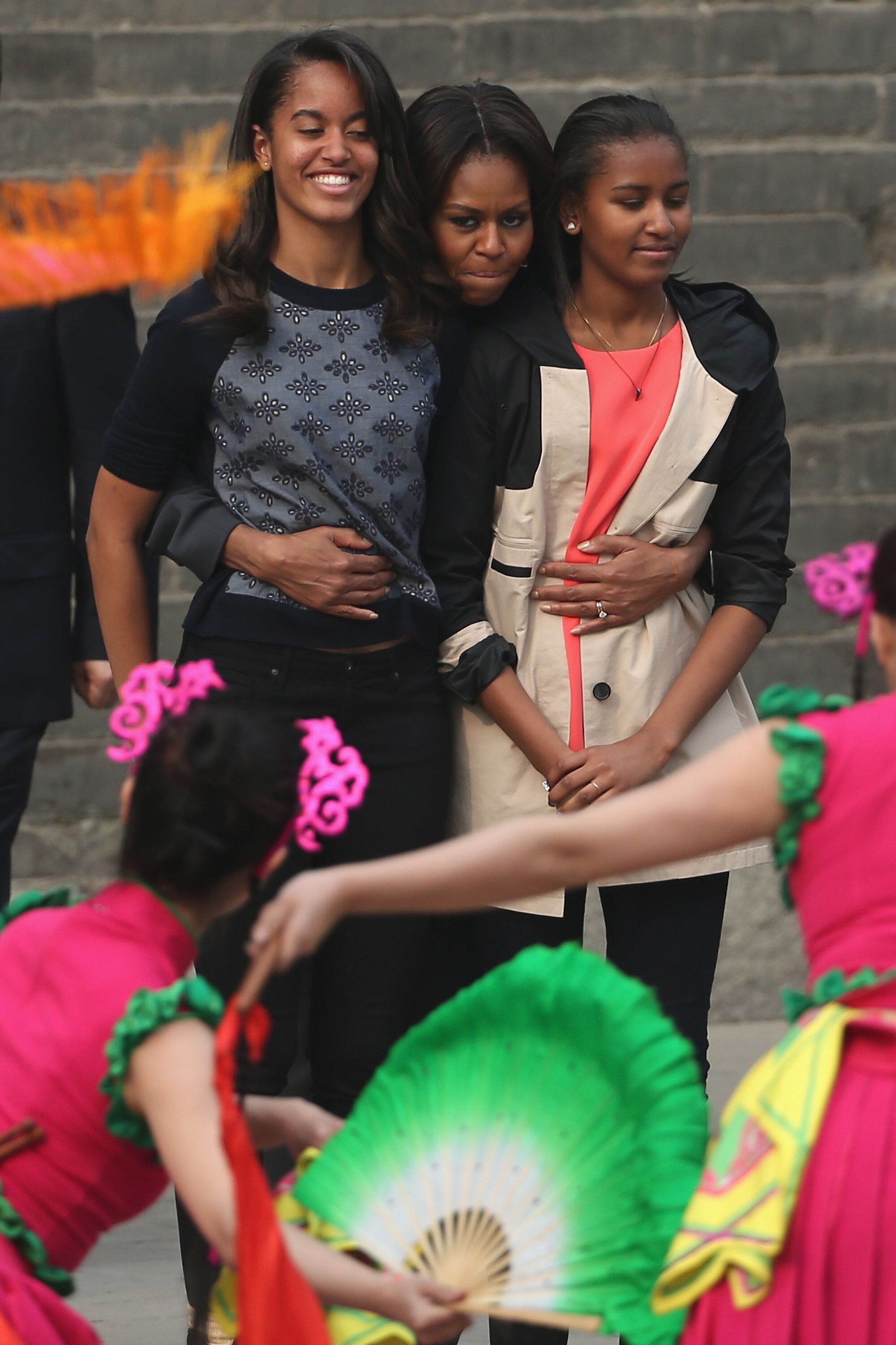 Former First Lady Michelle Obama with daughters Malia and Sasha on a 2014 visit to China/ Source: Getty Images