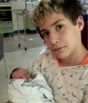 Chris McBride with his newborn baby | Source: youtube.com/Inside Edition