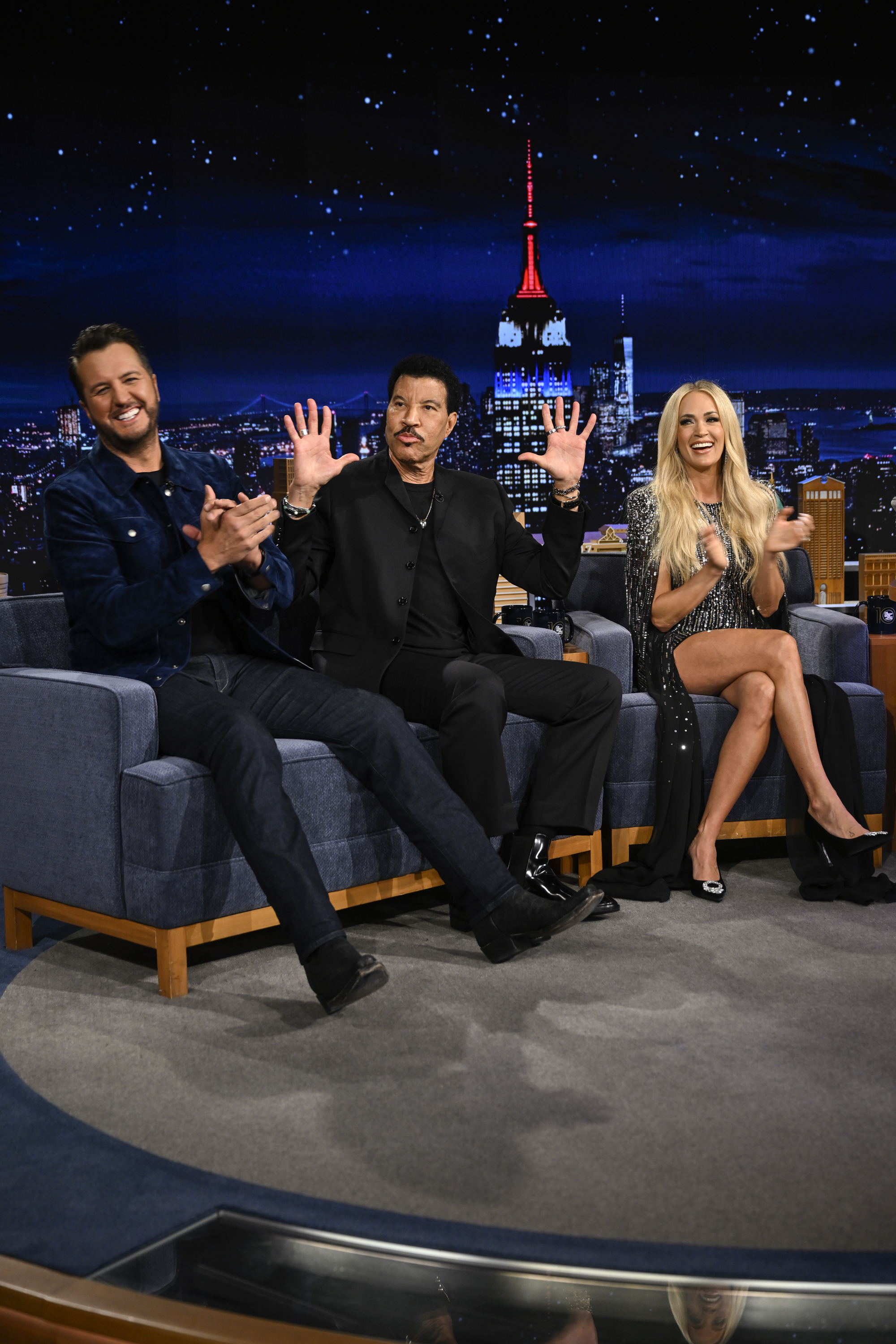 Luke Bryan, Lionel Richie, and Carrie Underwood are pictured during an interview on March 5, 2025 | Source: Getty Images