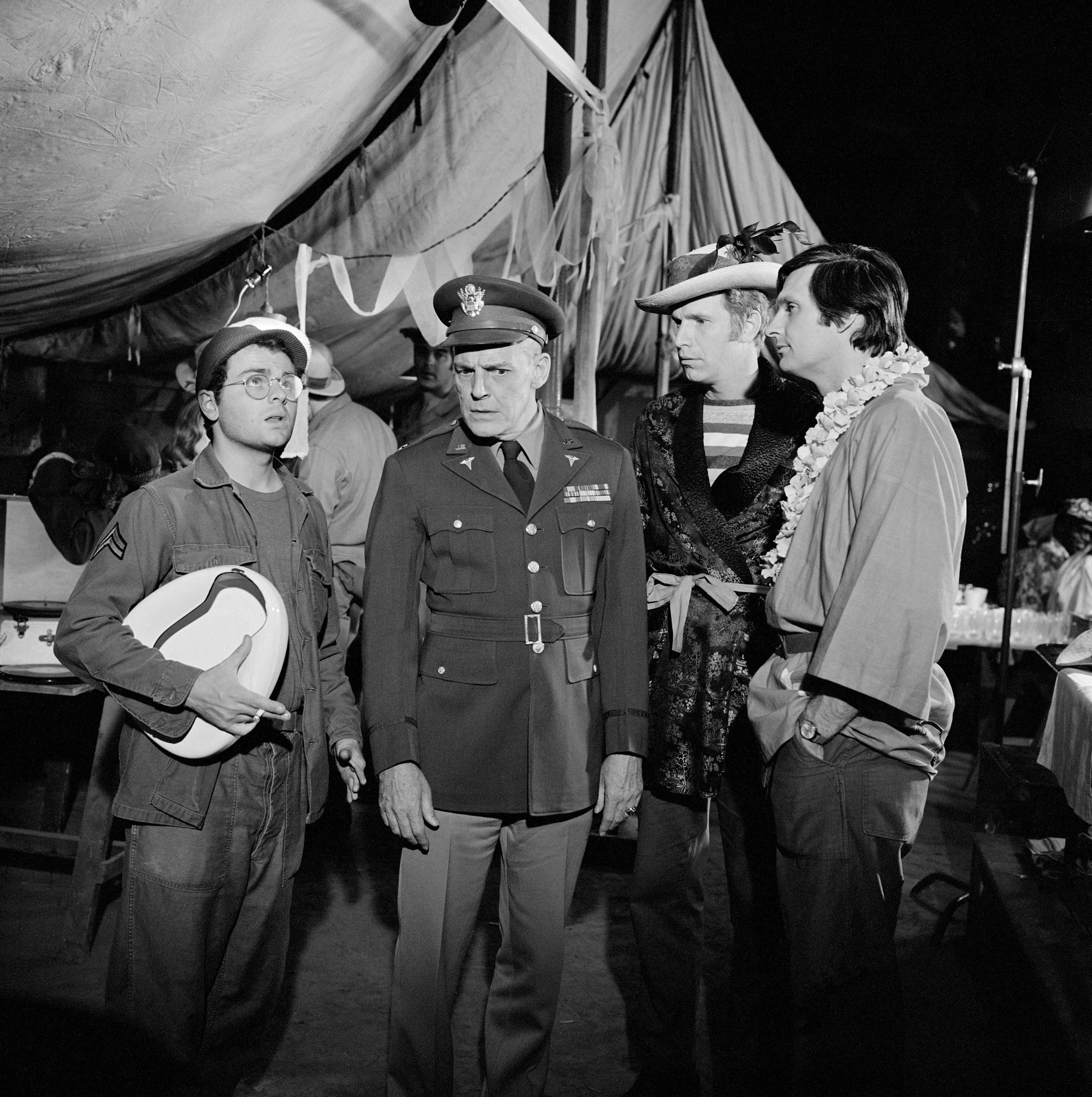 Gary Burghoff as Walter Eugene O'Reilly, G. Wood as Charlie Hammond, Wayne Rogers as John McIntyre, and Alan Alda as Benjamin Franklin Pierce in the pilot episode of M*A*S*H (MASH). Image date: April 13, 1972. | Source: Getty Images