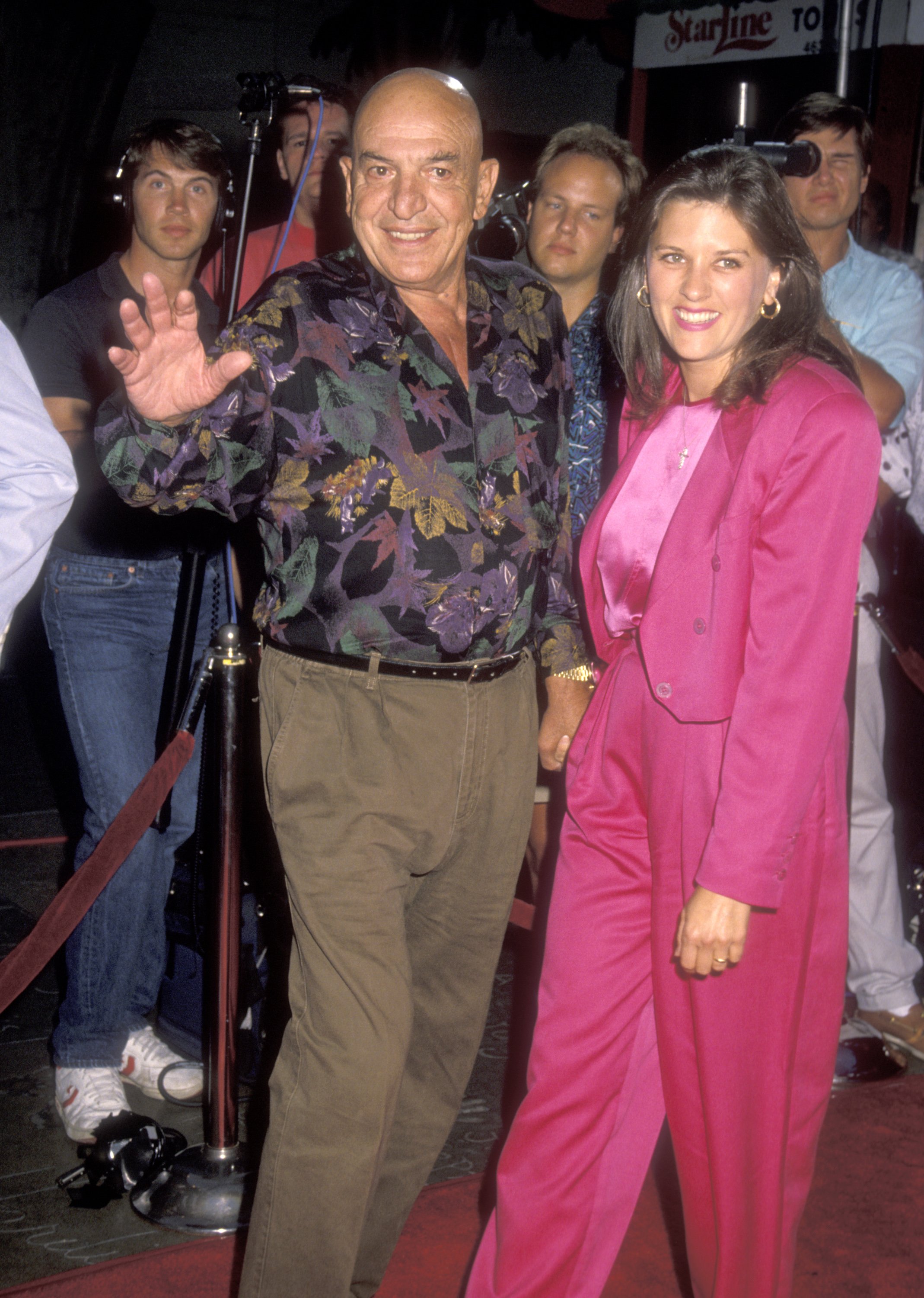 Actor Telly Savalas and wife Julie Savalas attend the "Air America" Hollywood Premieres at Mann's Chinese Theatre in Hollywood, California. | Source: Getty Images