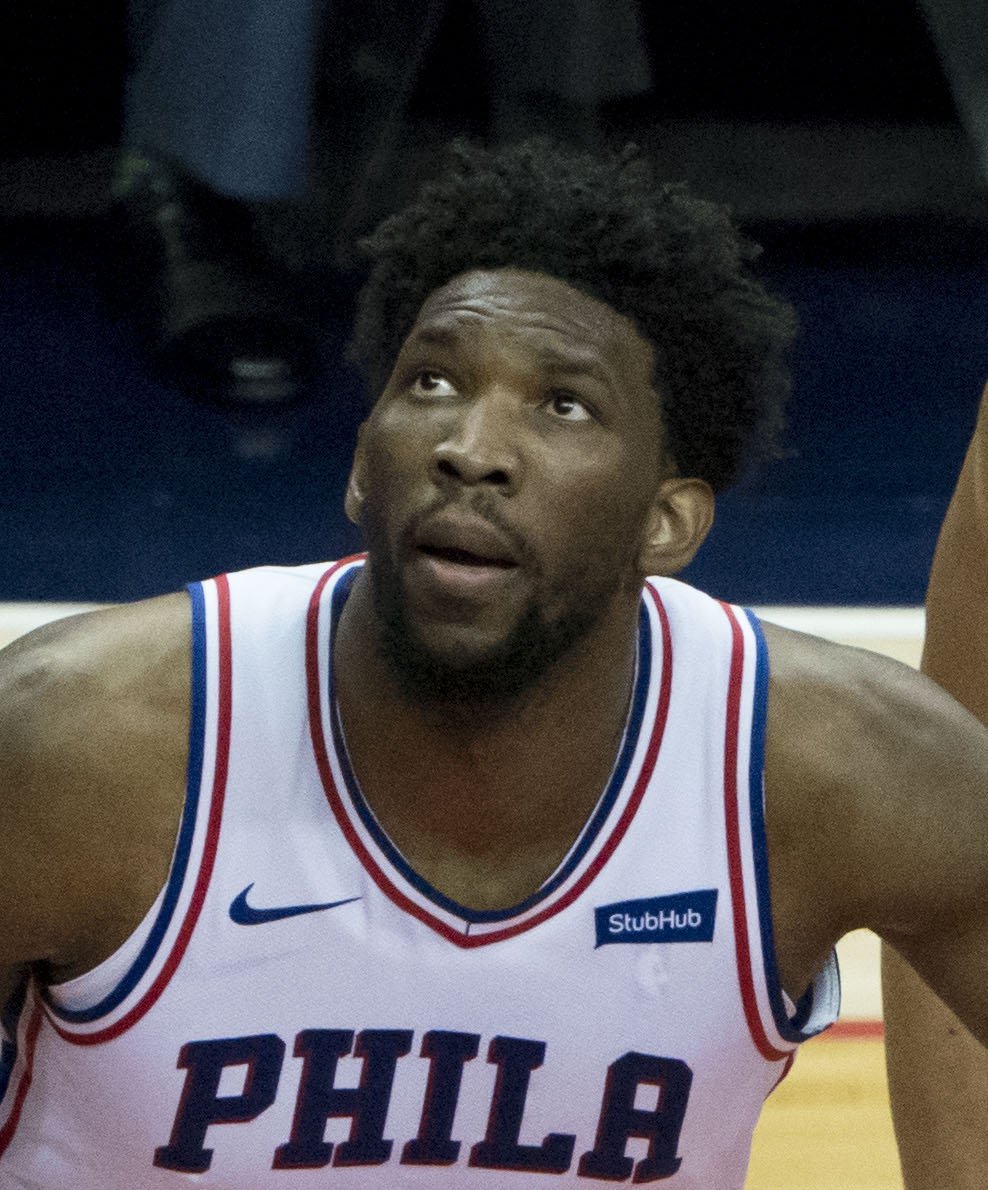 Joel Embiid of the 76ers at a game against the Wizards on February 8, 2018. | Photo by Keith Allison, Joel Embiid 2018c, CC BY-SA 2.0, Wikimedia Commons