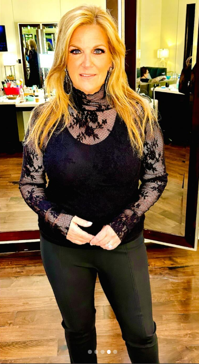 Trisha Yearwood dazzles in a semi-sheer outfit, showcasing her slim figure at a recent concert in Las Vegas in July 2024. | Source: Instagram.com/trishayearwood
