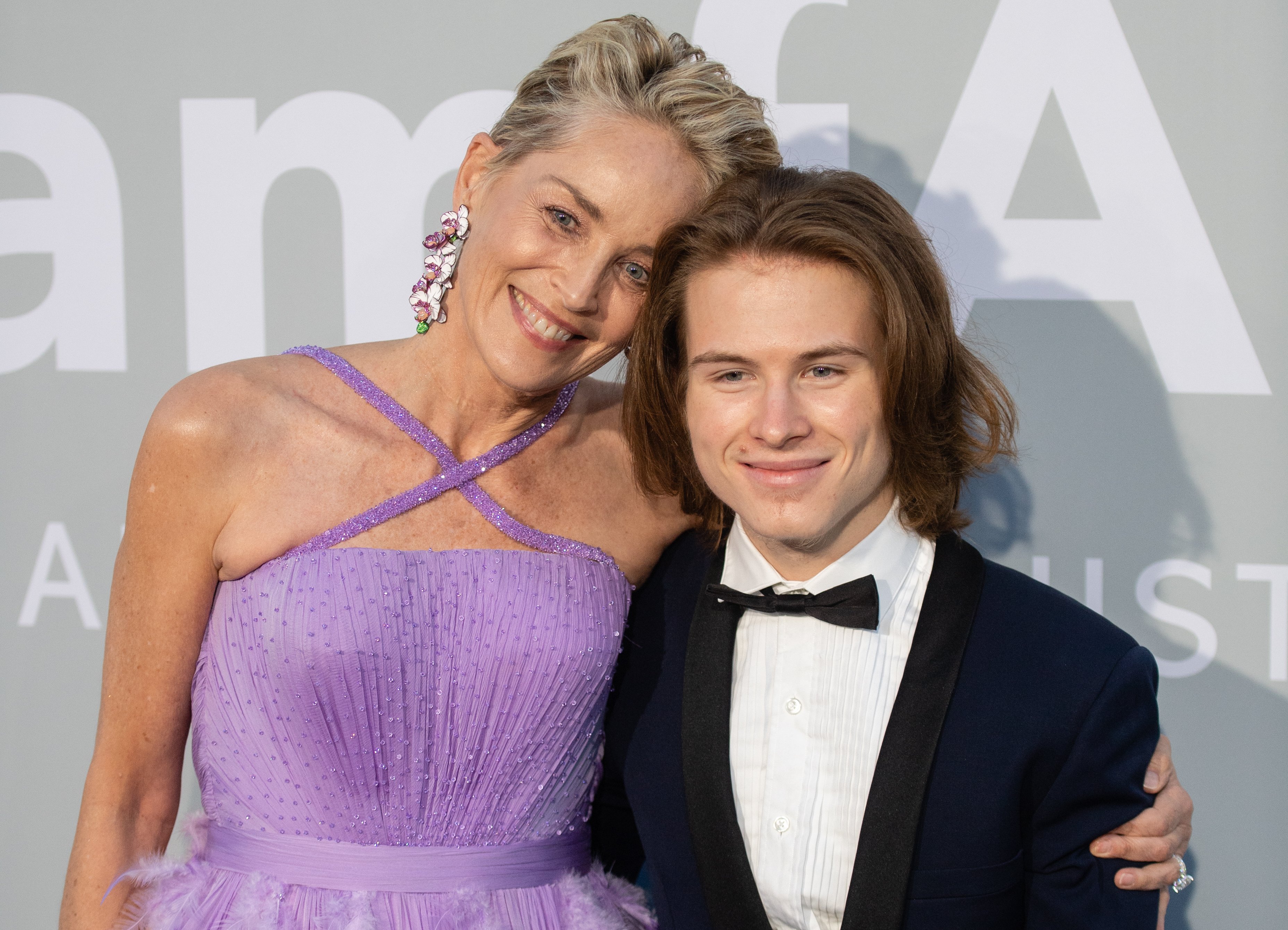 Sharon Stone and Roan Bronstein at the amfAR Cannes Gala during the 74th Annual Cannes Film Festival on July 16, 2021, in Cap d'Antibes, France. | Source: Samir Hussein/WireImage/Getty Images