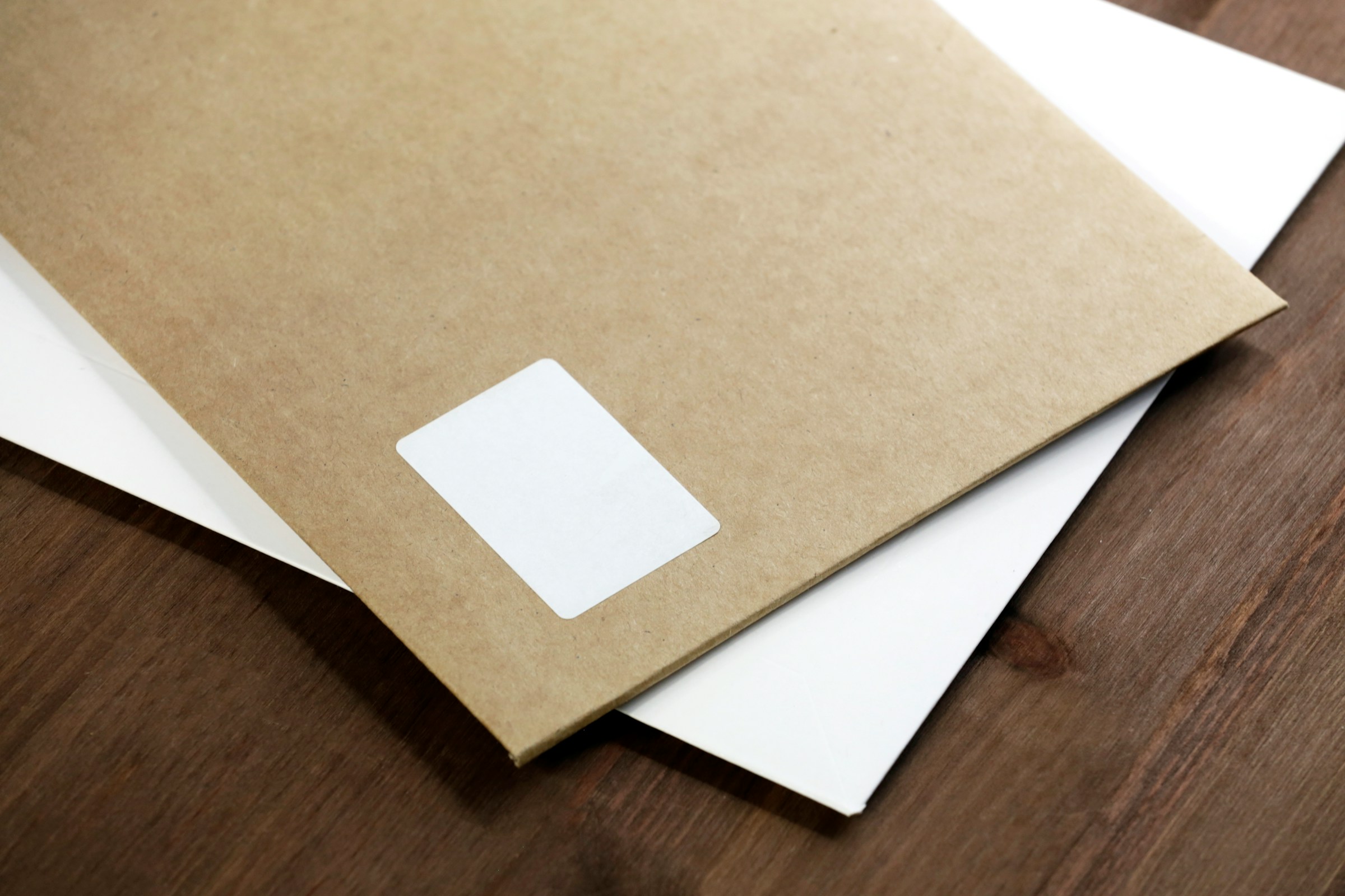 Two envelopes on a table | Source: Unsplash
