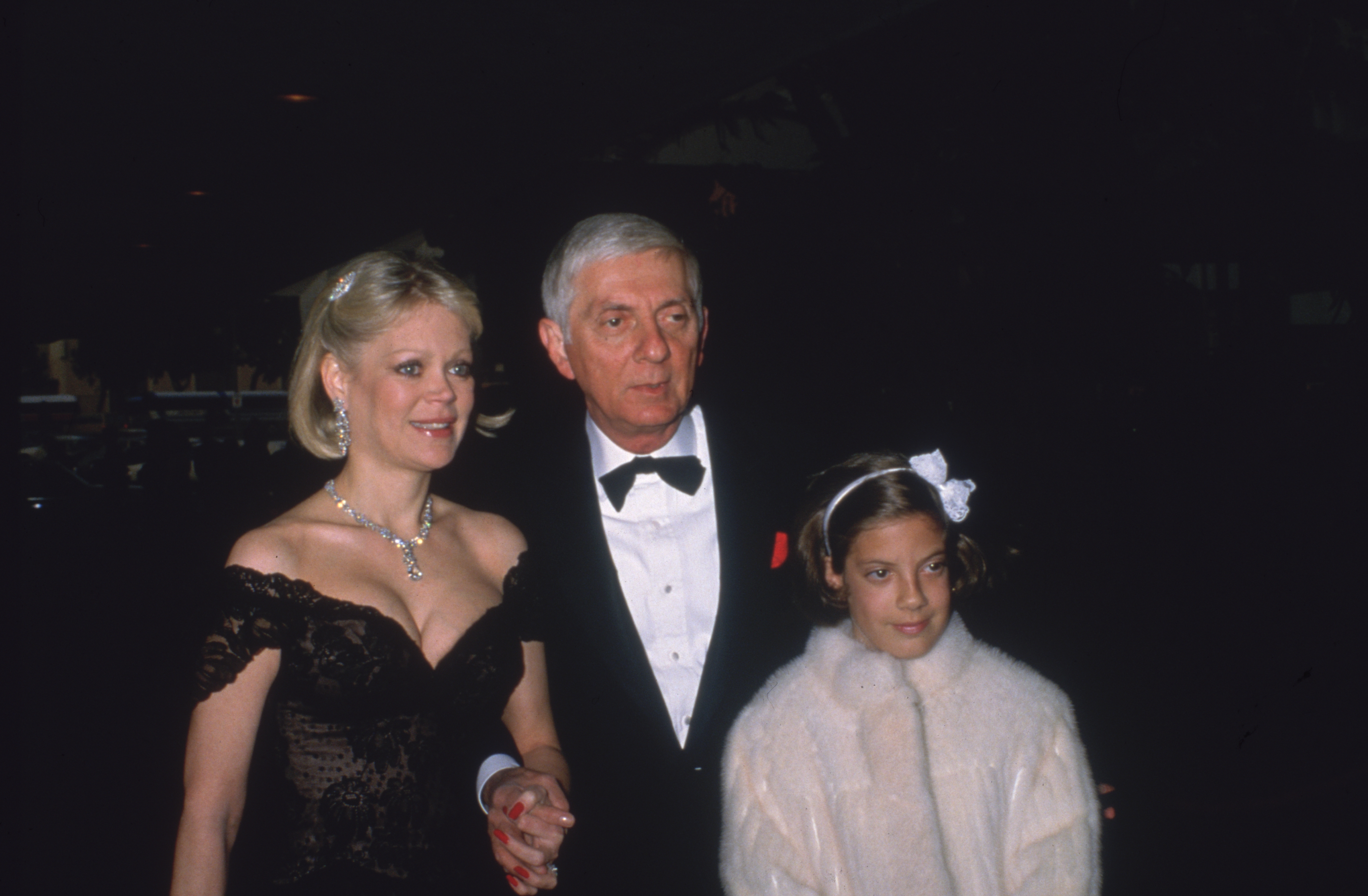 Candy, Aaron, and Tori Spelling at a formal event in 1985 | Source: Getty Images