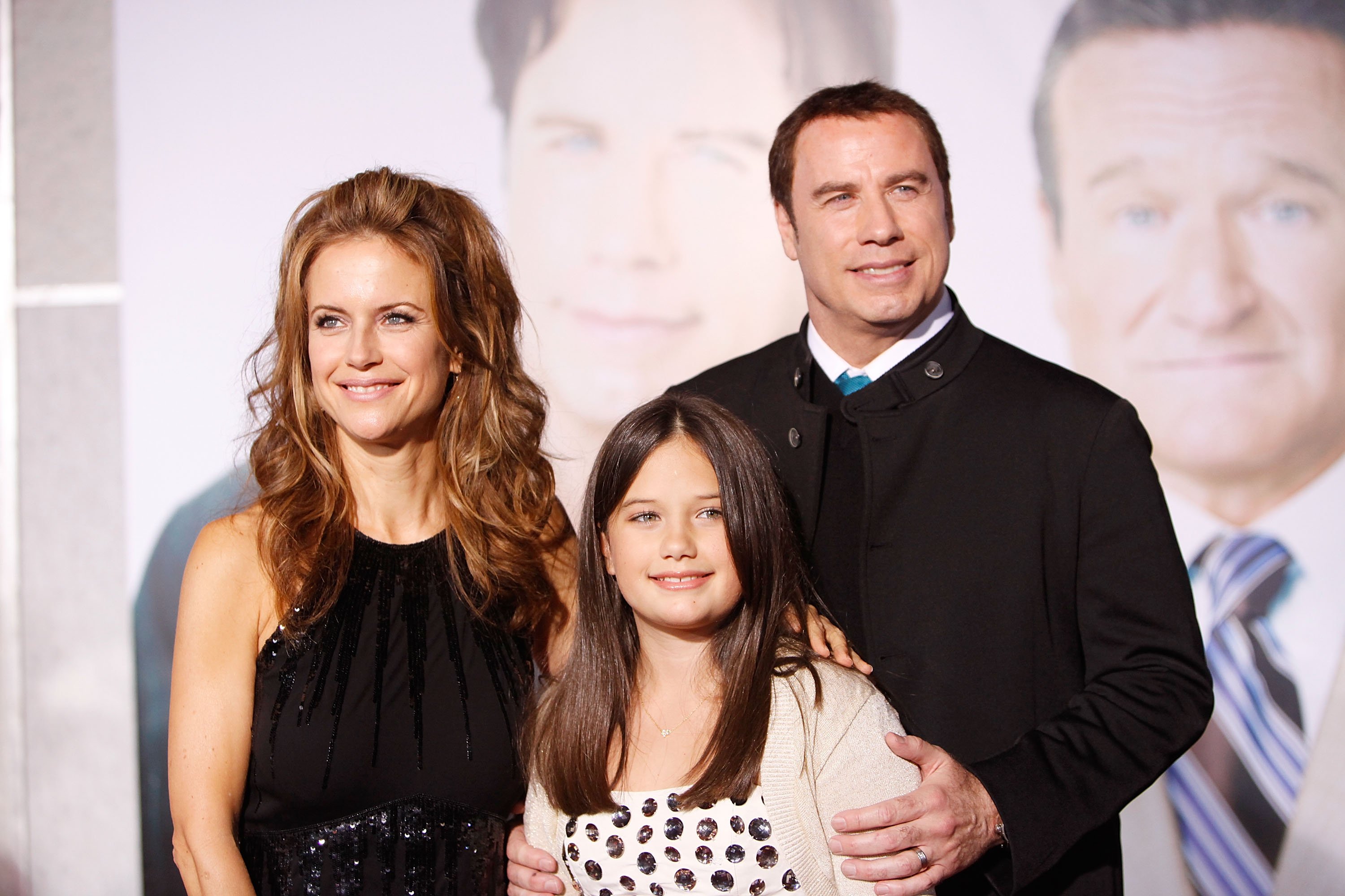 Kelly Preston, Ella Bleu Travolta, and John Travolta arrive at the Los Angeles premiere of "Old Dogs" held at the El Capitan Theatre on November 9, 2009, in Hollywood, California. | Source: Getty Images