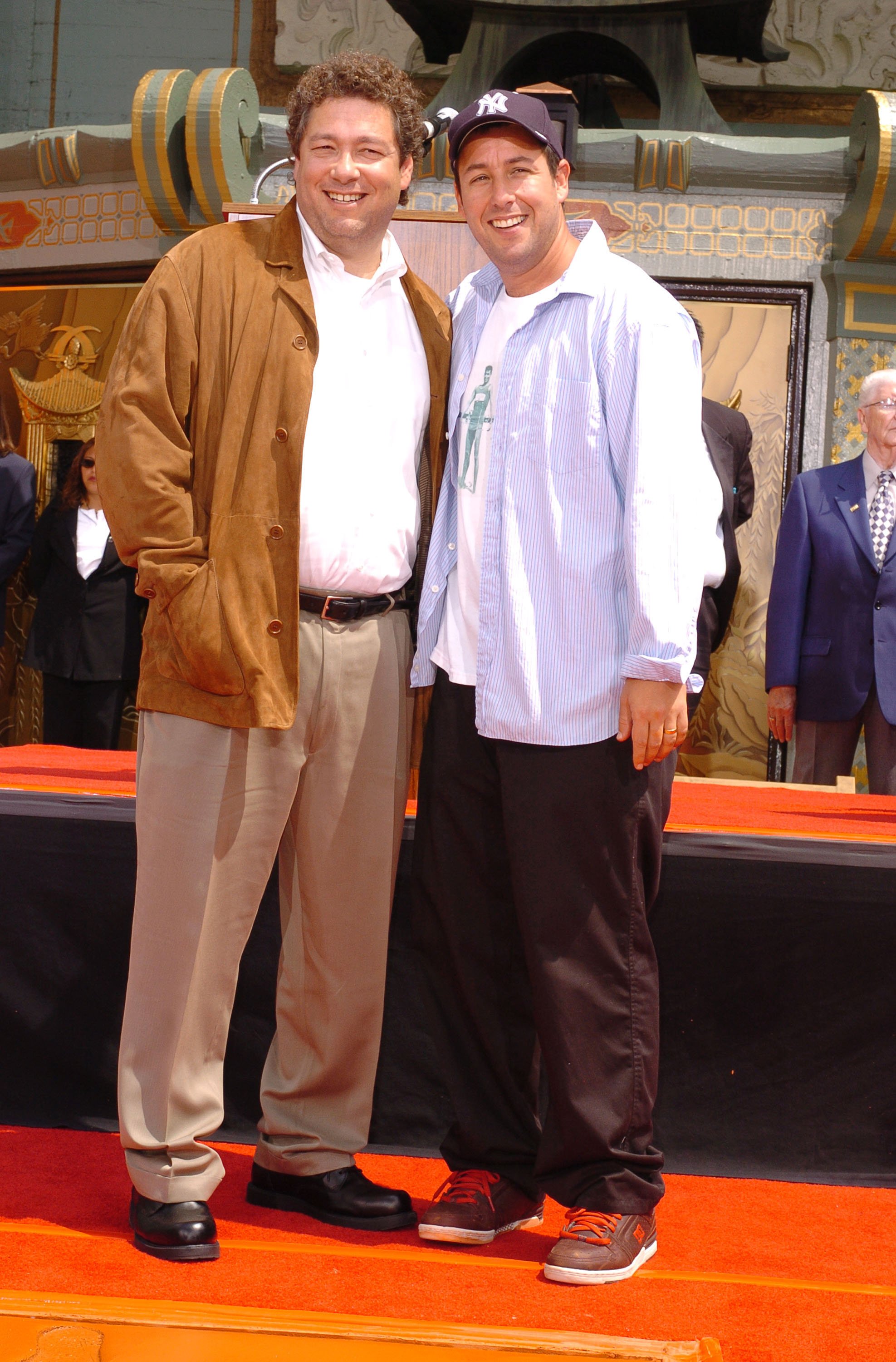 Adam Sandler and Scott Sandler the actor's Footprint Ceremony at Chinese Theatre in Hollywood, California, United States. | Source: Getty Images