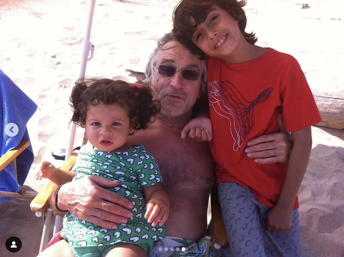 Robert De Niro with his grandchildren from an Instagram carousel of images and a video, dated August 18, 2024 | Source: Instagram/drenadeniro/