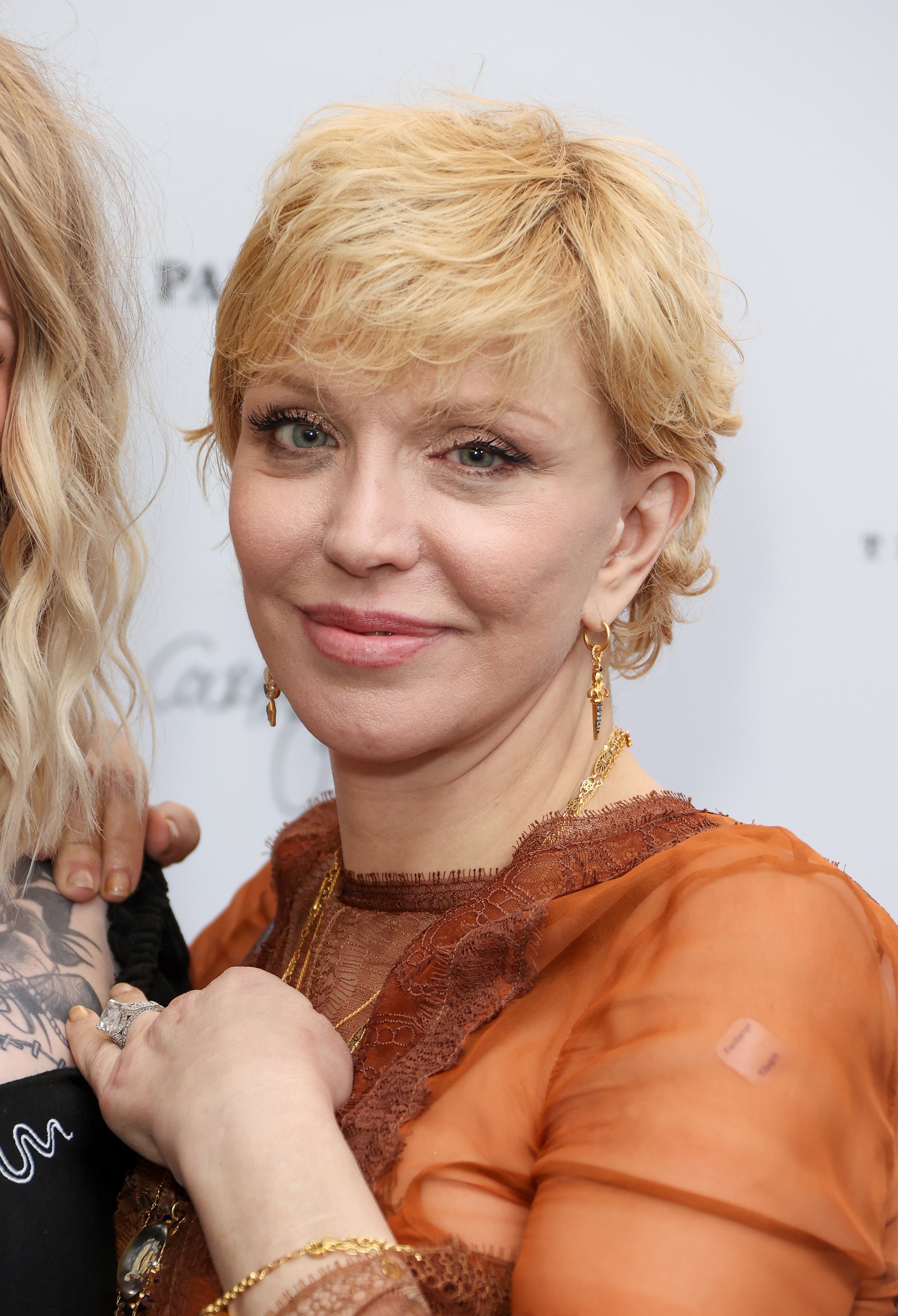 Courtney Love at the "Pretty On The Inside" Courtney Love x Parliament Tattoo exhibition private viewing on September 30, 2021, in London | Source: Getty Images
