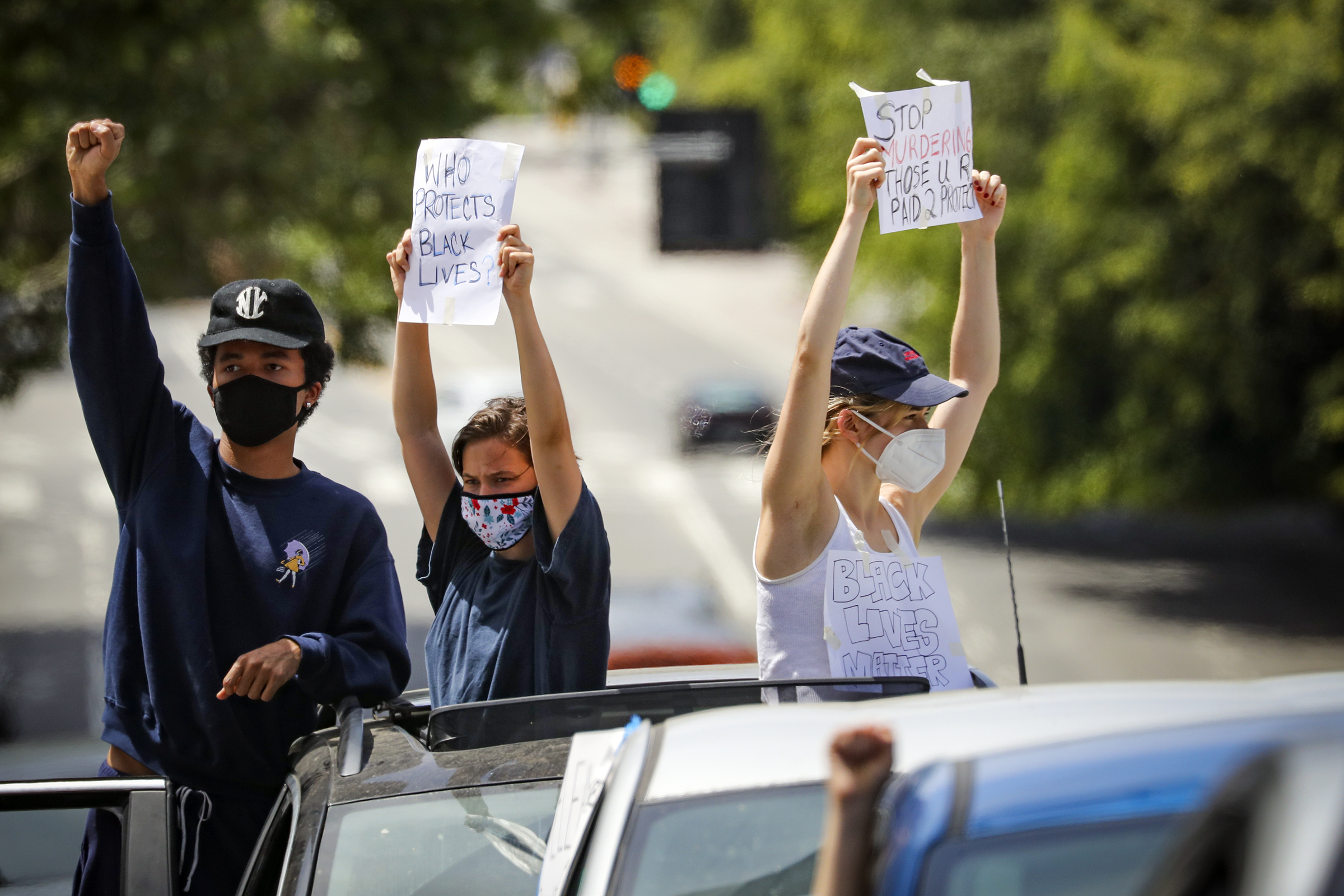 Raymond Alexander Cham Jr., Cailee Spaeny, and Ruby Cruz protesting the killing of George Floyd in front of LAPD Headquarters on Saturday, May 30, 2020, in Los Angeles, California. | Source: Getty Images