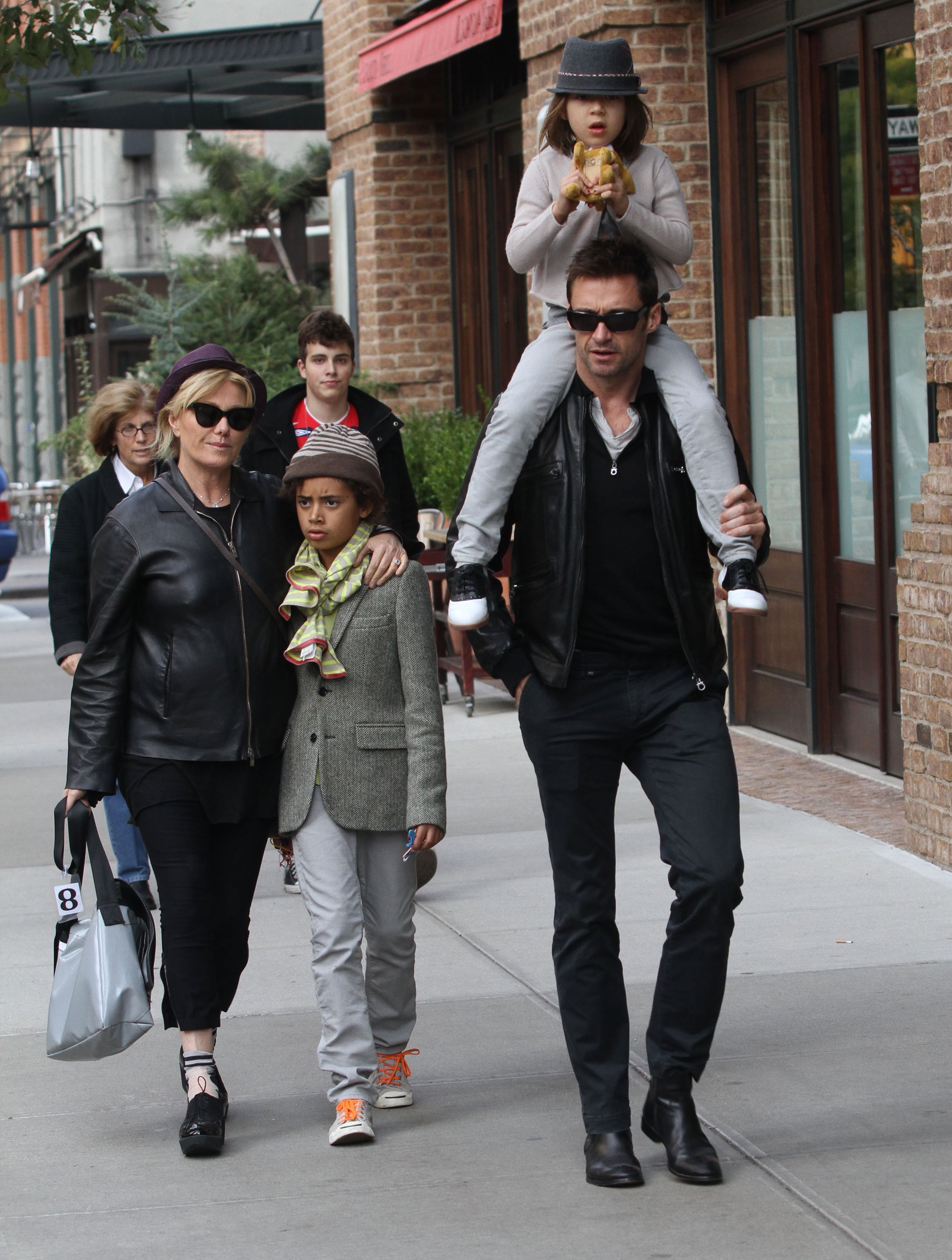 Deborra-Lee Furness, son Maximillian Jackman, daughter Ava Eliot Jackman and Hugh Jackman are seen arriving at Laughing Man Marketplace in Manhattan on October 23, 2011 in New York City. | Source: Getty Images