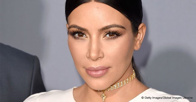 Kim Kardashian shares photo of son Saint holding baby sister Chicago on his shoulders