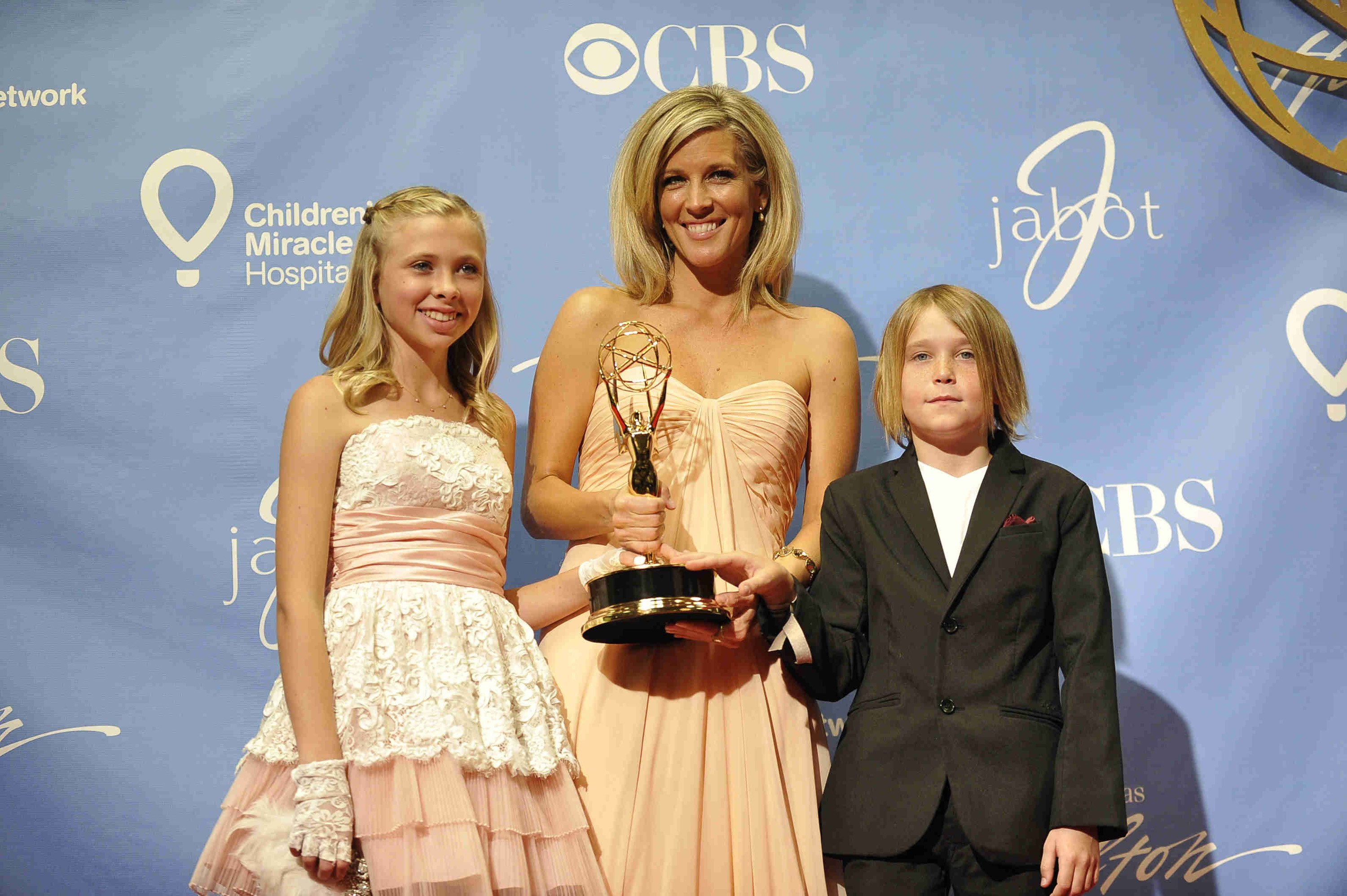 Laura Wright with her children at the 38th Annual Daytime Entertainment Emmy Awards in 2011 in Las Vegas. | Source: Getty Images