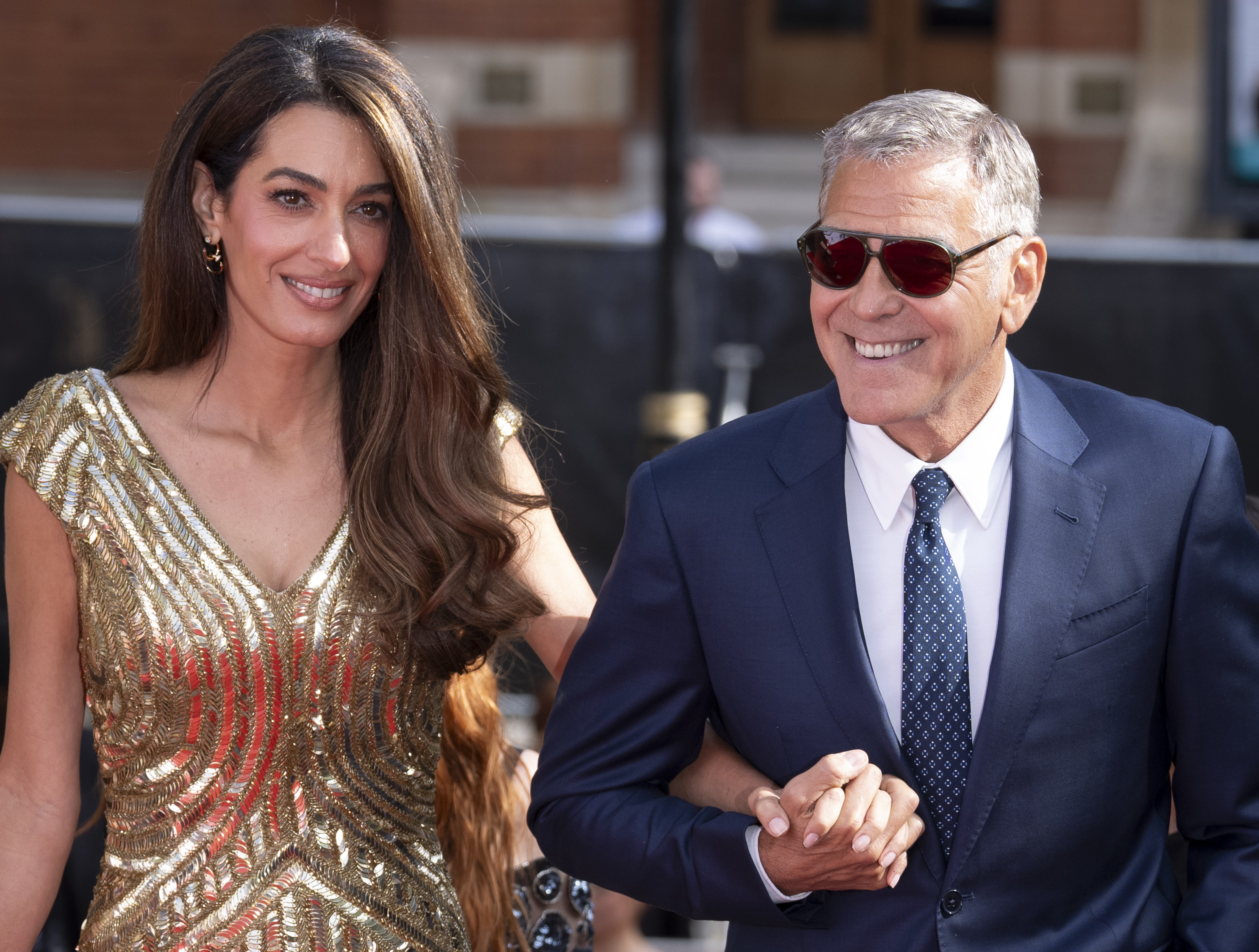 mal Clooney smiles beside George Clooney during the "A King's Trust 50th Anniversary Celebration" in London on May 11, 2026 | Source: Getty Images