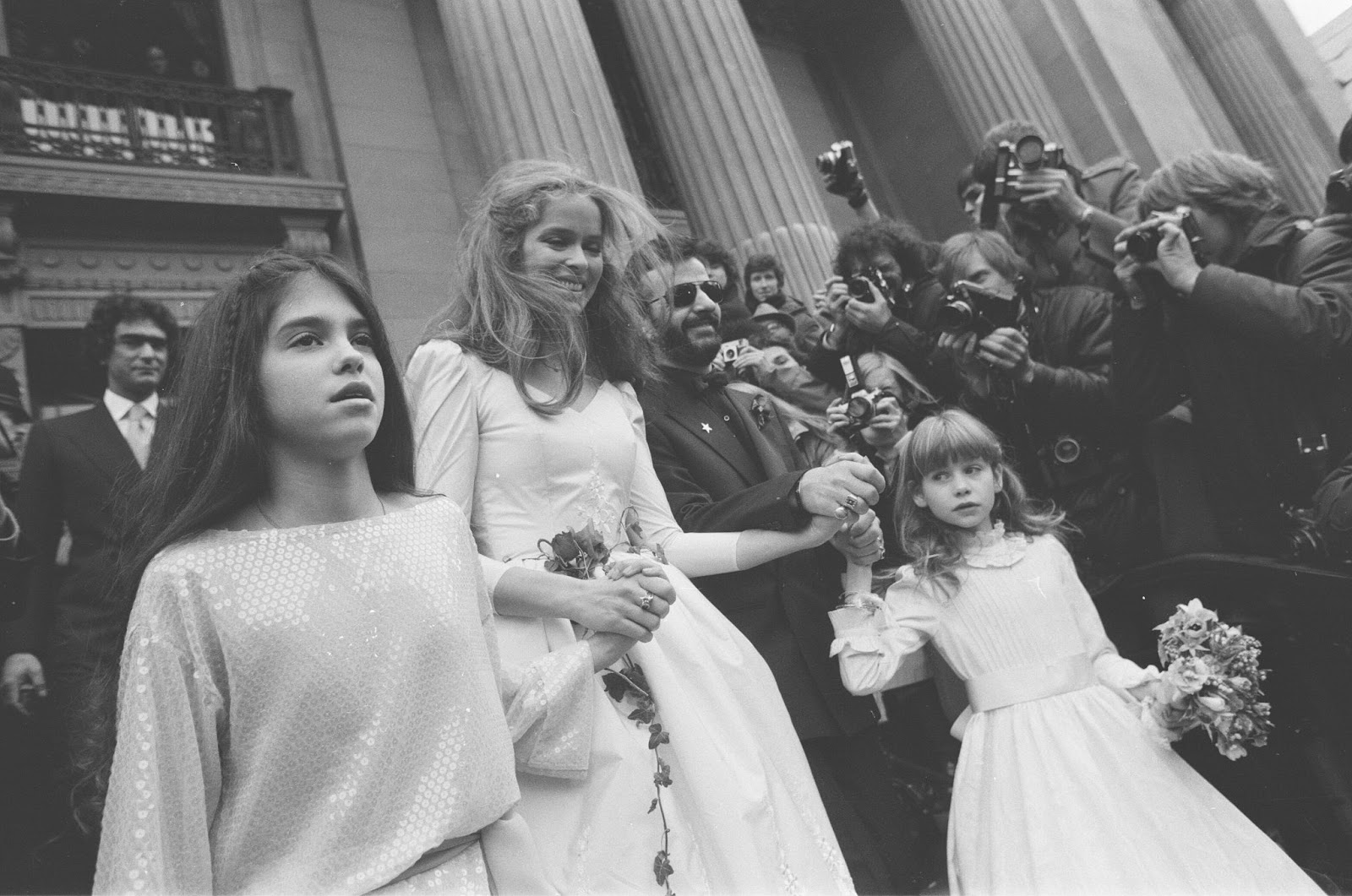 The actress and Ringo Starr on their wedding day at Old Marylebone Town Hall with Francesca Gregorini and Lee Starkey on April 26, 1981 | Source: Getty Images