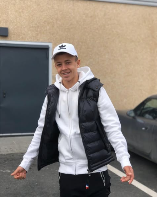 Luca Manolache posing in a parking lot, from a post dated March 15, 2020 | Source: Instagram/manolache_luca10