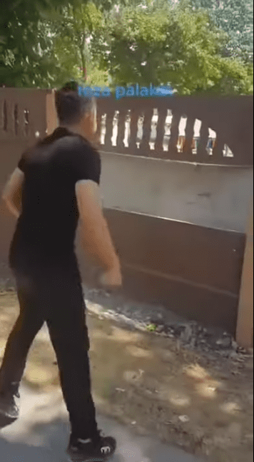 Screenshot of video showing the boy kicking down a fence. | Source: Reddit/ @Nurillauz