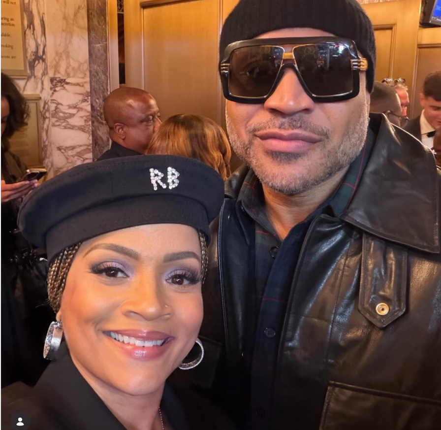 LL Cool J and Simone Smith pose for a close-up selfie at the opening night of "Joe Turner's Come and Gone," with Simone smiling brightly in a chic black beret and hoop earrings while LL Cool J stands beside her in a black leather jacket, knit cap, and oversized sunglasses. | Source: Instagram/sislovespurple