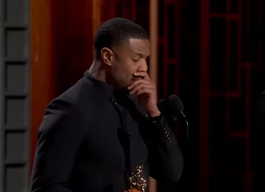 An emotional Michael B. Jordan reflects on the legacy of those who paved the way before him during his acceptance speech. | Source: YouTube/ABCNews