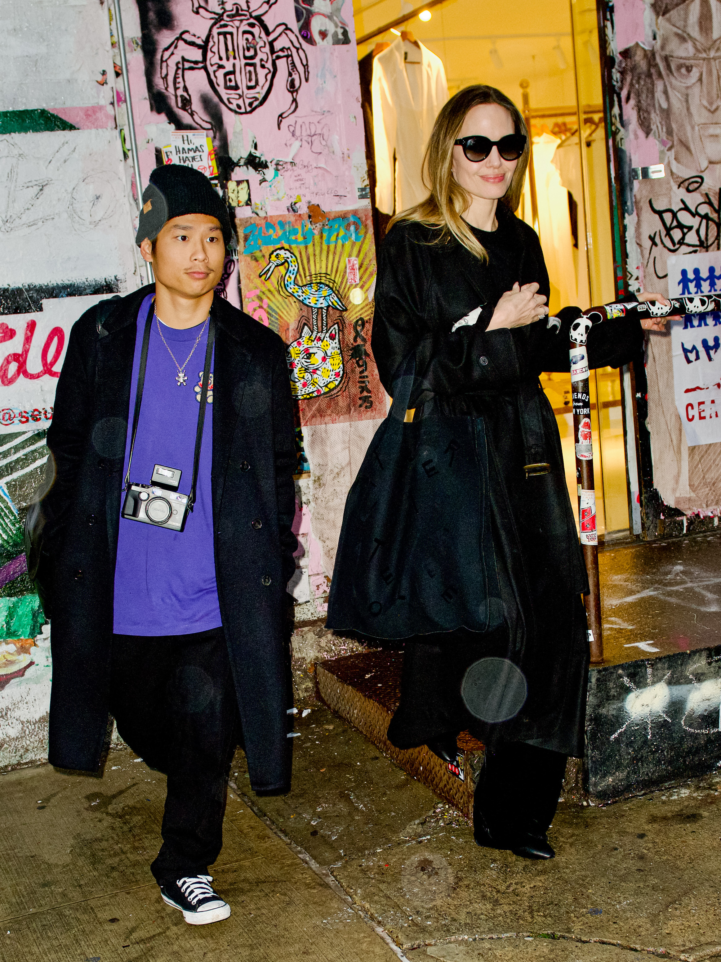 Pax Jolie-Pitt and Angelina Jolie in New York City on December 28, 2023 | Source: Getty Images