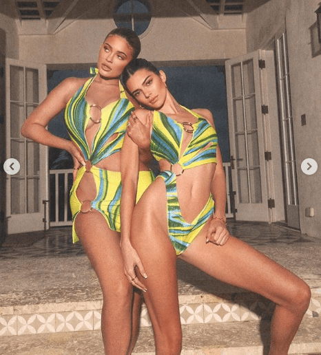 Kendall and Kylie Jenner in matching designer monokini swimwear during their vacation in the Bahamas on March 3, 2020. | Source: Instagram/kyliejenner.