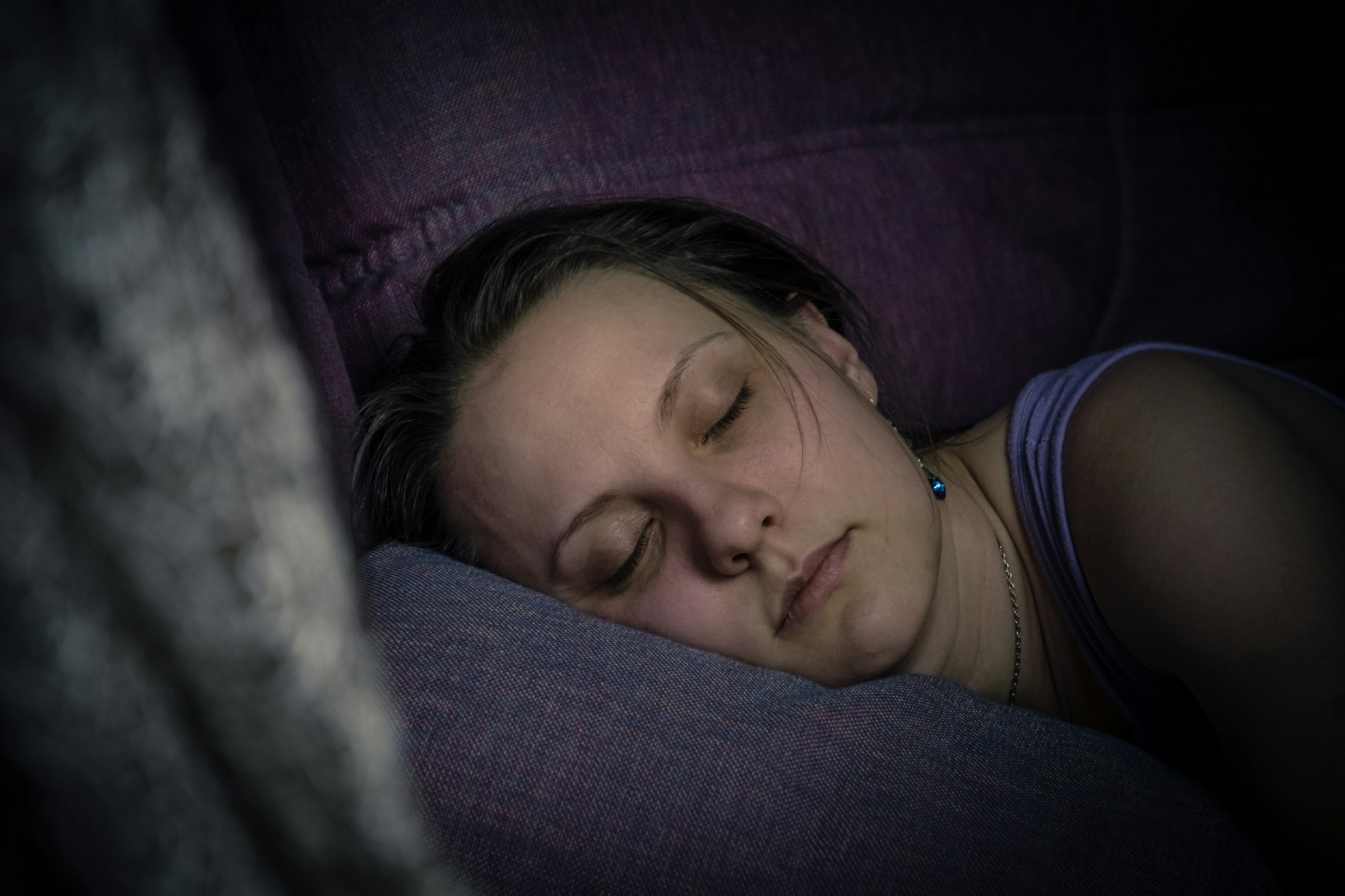 A woman sleeping on the couch | Source: Unsplash