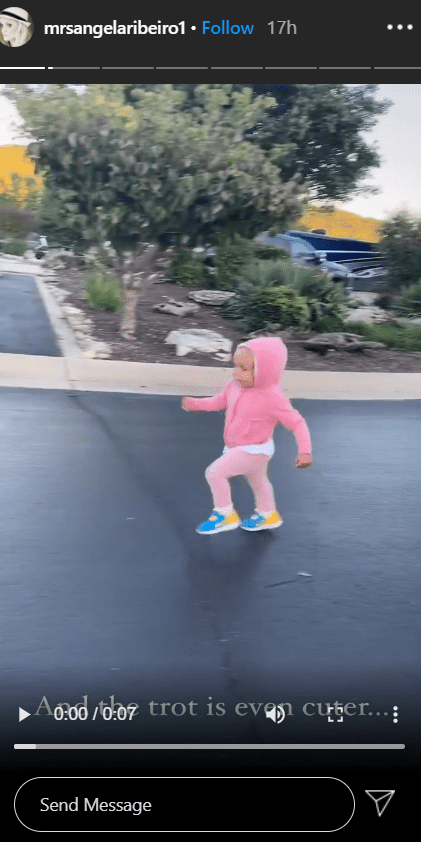 A screenshot of Alfonso Ribeiro's daughter, Ava in her pink sweatsuit and sneaker | Photo: Instagram/mrsangelaribeiro1