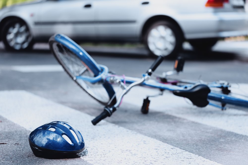 A photo of an accident involving a car and a cyclist | Photo: Shutterstock