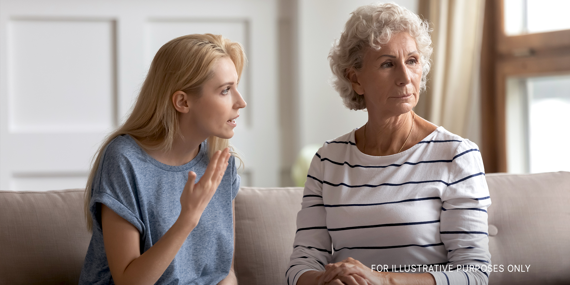 A young woman talking sternly to an older woman | Source: Shutterstock
