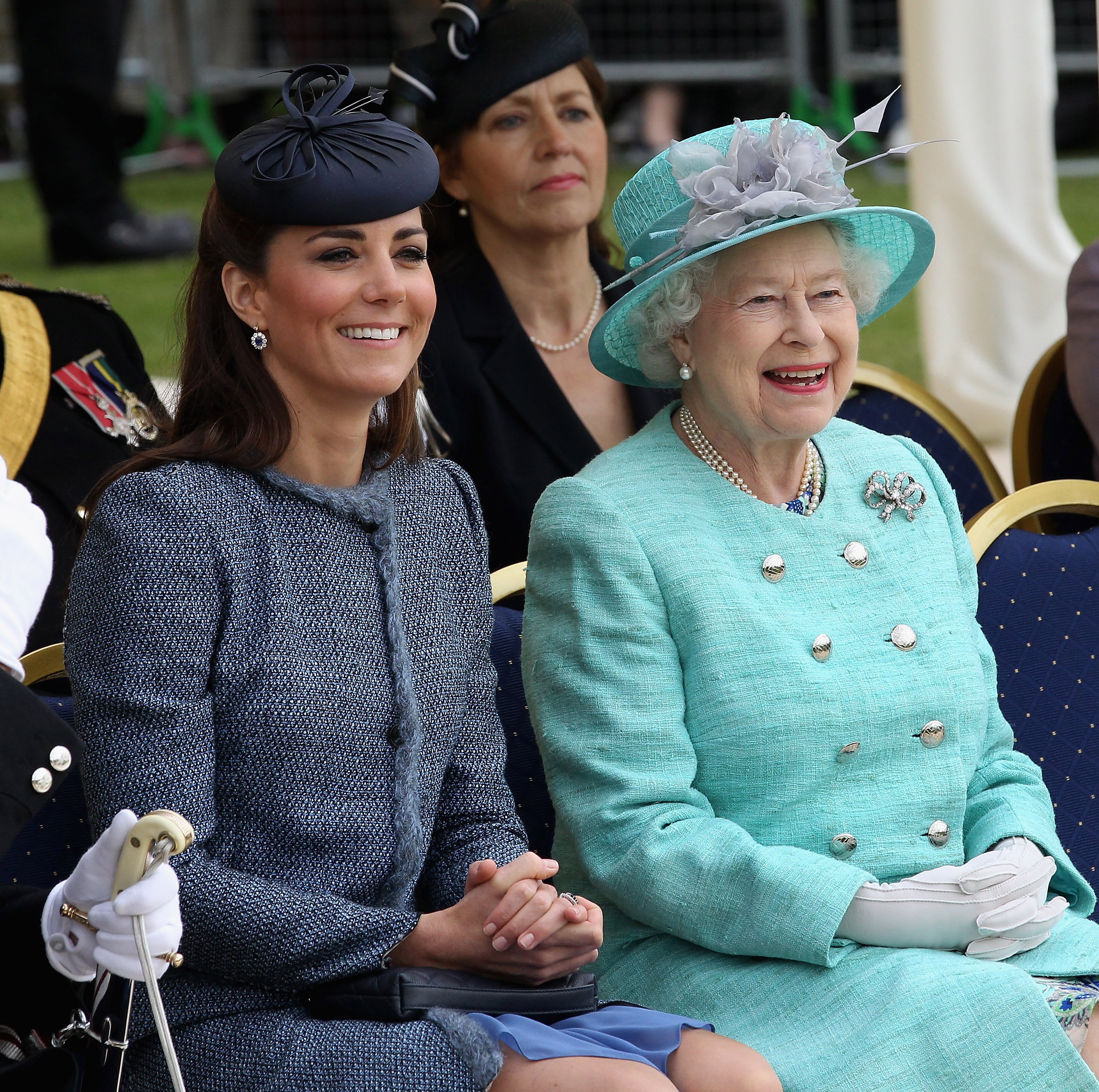 Catherine, Duchess of Cambridge, and Queen Elizabeth II smiles during their visit to Vernon Park on June 13, 2012, in Nottingham, England. | Source: Getty Images