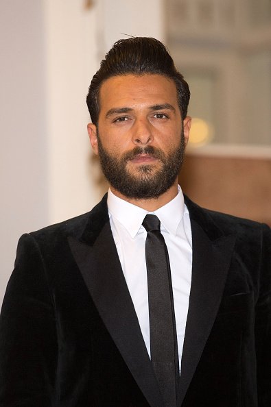 Maxim Nucci assiste au 29e Festival du film romantique de Cabourg le 12 juin 2015 à Cabourg, France. | Photo : Getty Images Maxim Nucci assiste au 29e Festival du film romantique de Cabourg le 12 juin 2015 à Cabourg, France. | Photo : Getty Images
