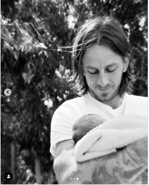 Riley Hawk sweetly holding his newborn son, Ronin Walker Cobain Hawk posted on September 29, 2024 | Source: Instagram.com/thespacewitch