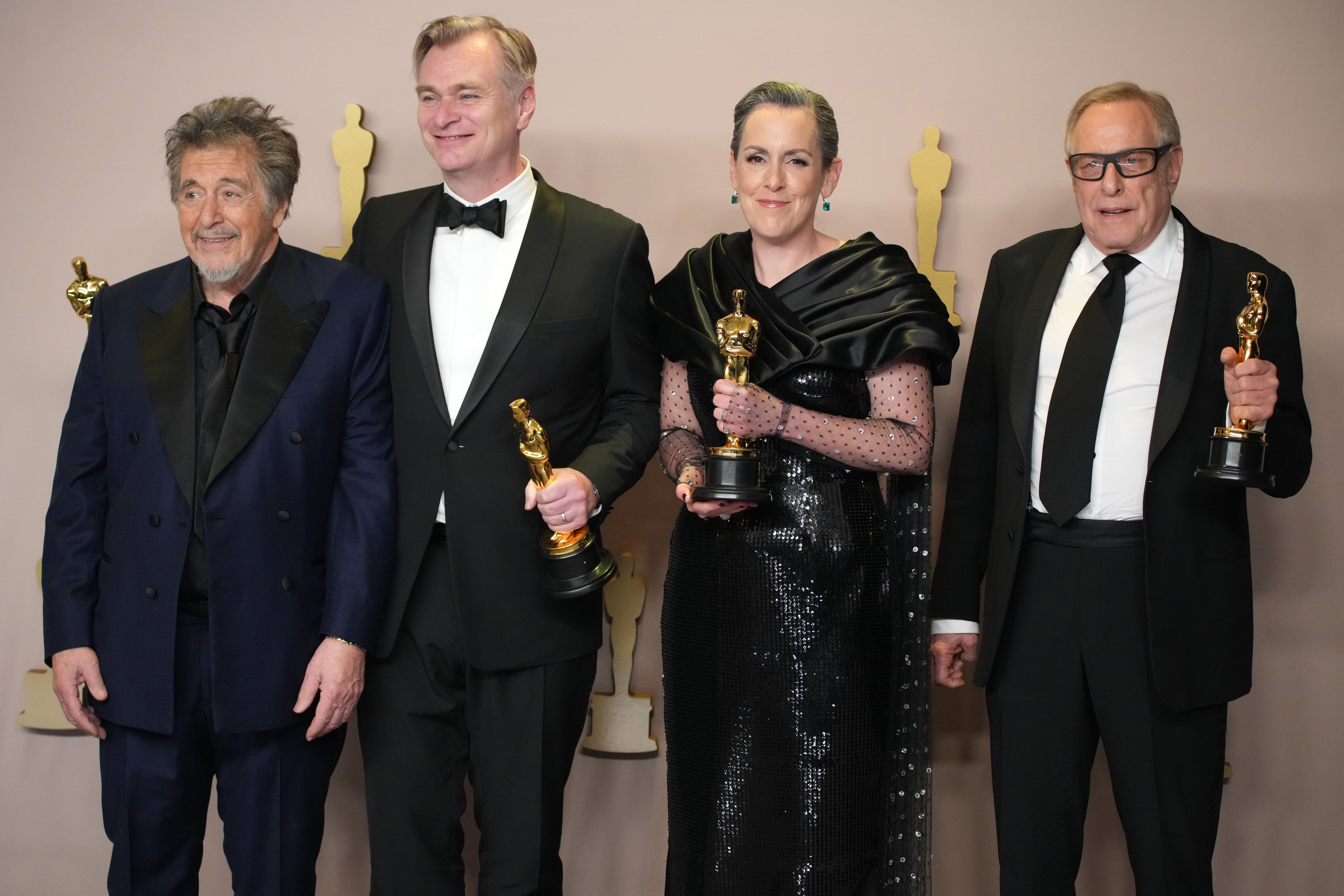 Christopher Nolan, Emma Thomas, and Charles Roven, winners of the Best Picture award for “Oppenheimer”, pose with Al Pacino during the 96th Annual Academy Awards on March 10, 2024 in Hollywood, California | Source:  Getty Images