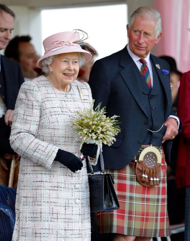 Queen Elizabeth II and Prince Charles, Prince of Wales attend the 2017 Braemar Gathering at The Princess Royal and Duke of Fife Memorial Park on September 2, 2017 in Braemar, Scotland. | Photo: Getty Images 