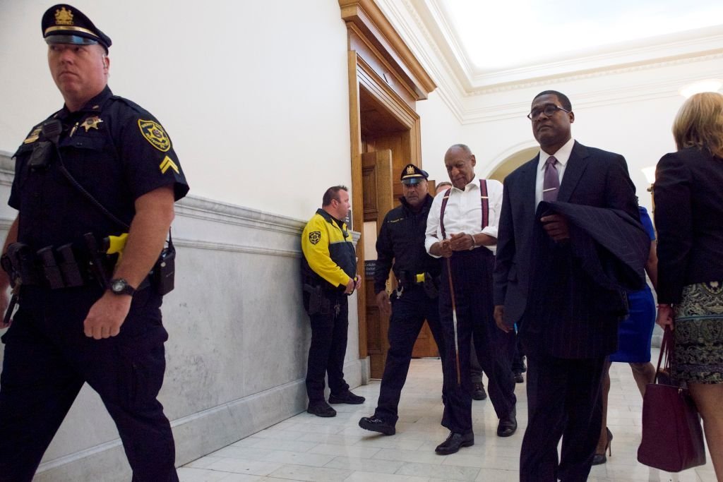 Bill Cosby being escorted out of the Montgomery County Courthouse to state prison in handcuffs on September 25, 2018, in Norristown, Pennsylvania | Source: Getty Images