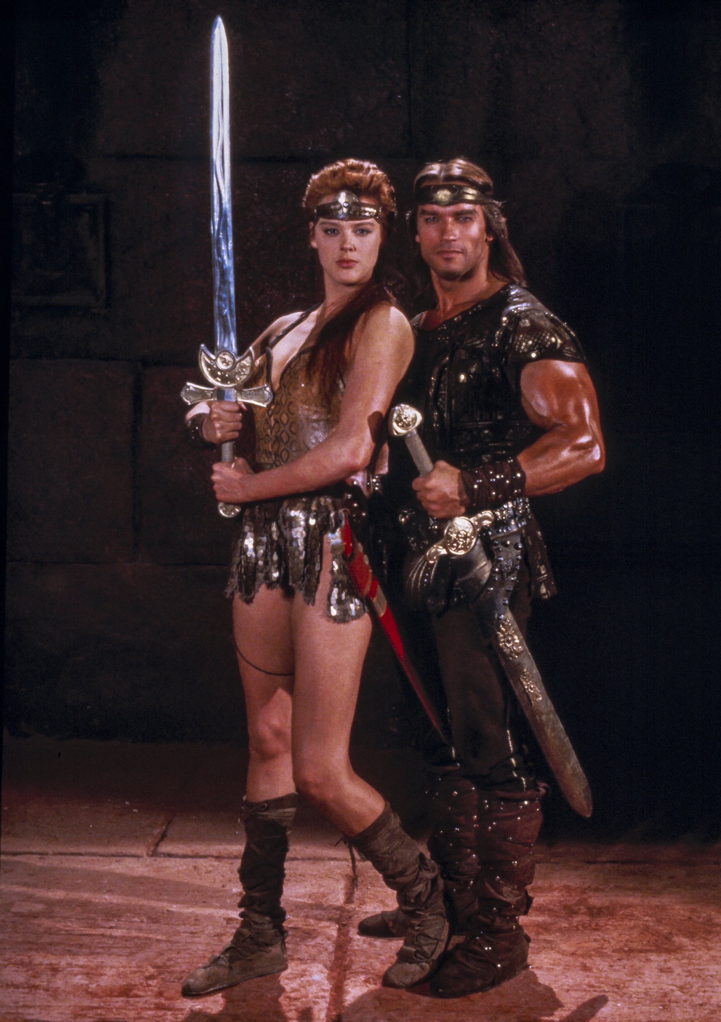 Brigitte Nielsen and Arnold Schwarzenegger in "Red Sonja" in Rome, Italy, 1984. | Source: Getty Images