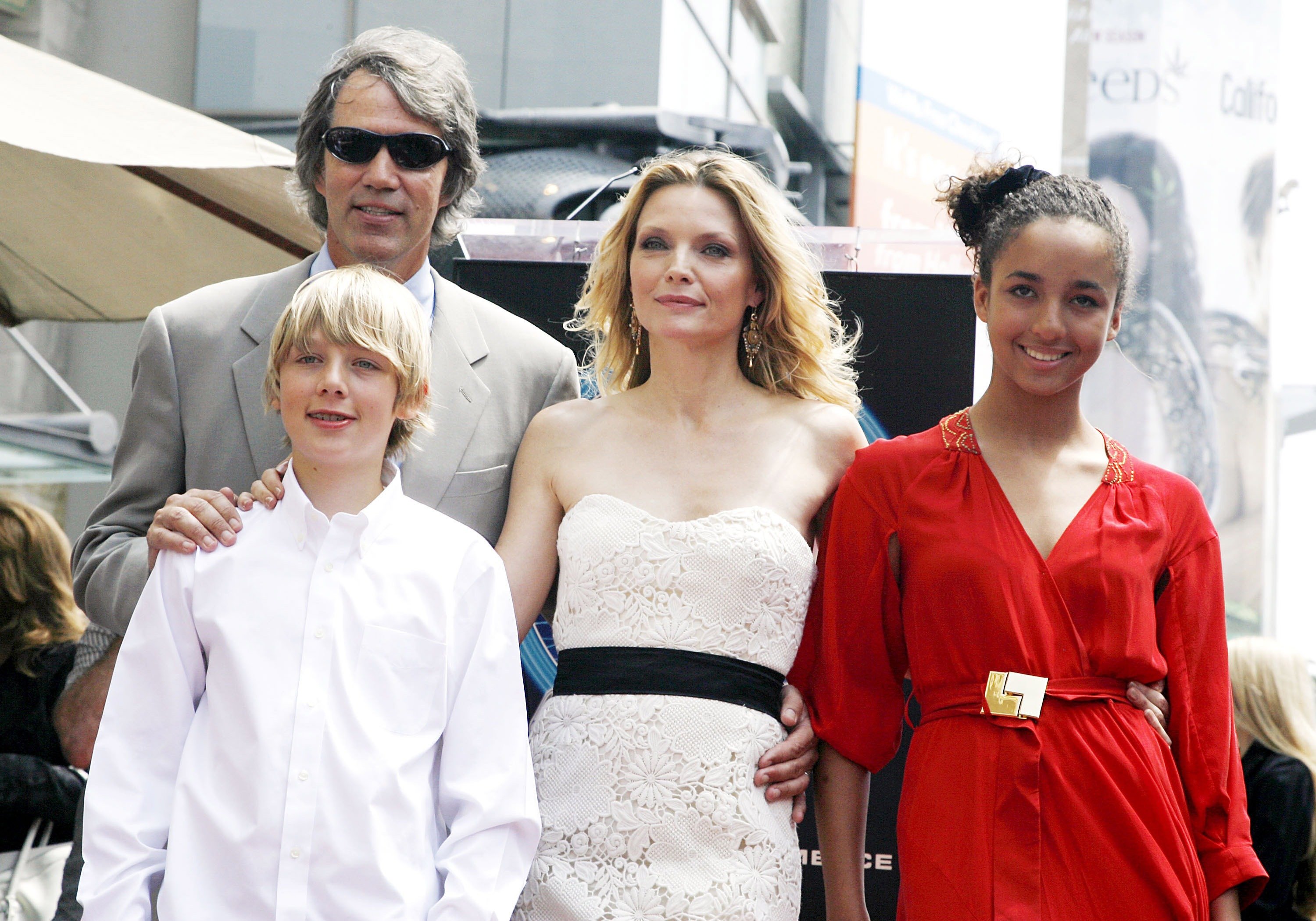 Michelle Pfeiffer, her husband David E. Kelley, their son John and daughter Claudia attend a ceremony honoring Michelle with a star on the Hollywood Walk of Fame on August 6, 2007, in Los Angeles, California | Source: Getty Images
