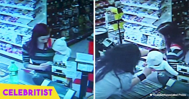 Store clerk rushes to grab baby from mother's arms and security camera footage explains her actions