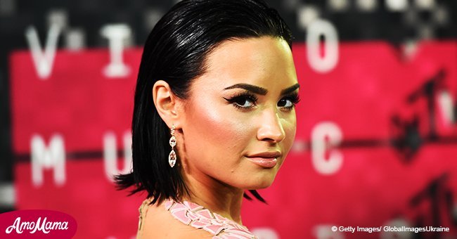 Demi Lovato sparks sexuality rumors after she's spotted kissing another woman passionately