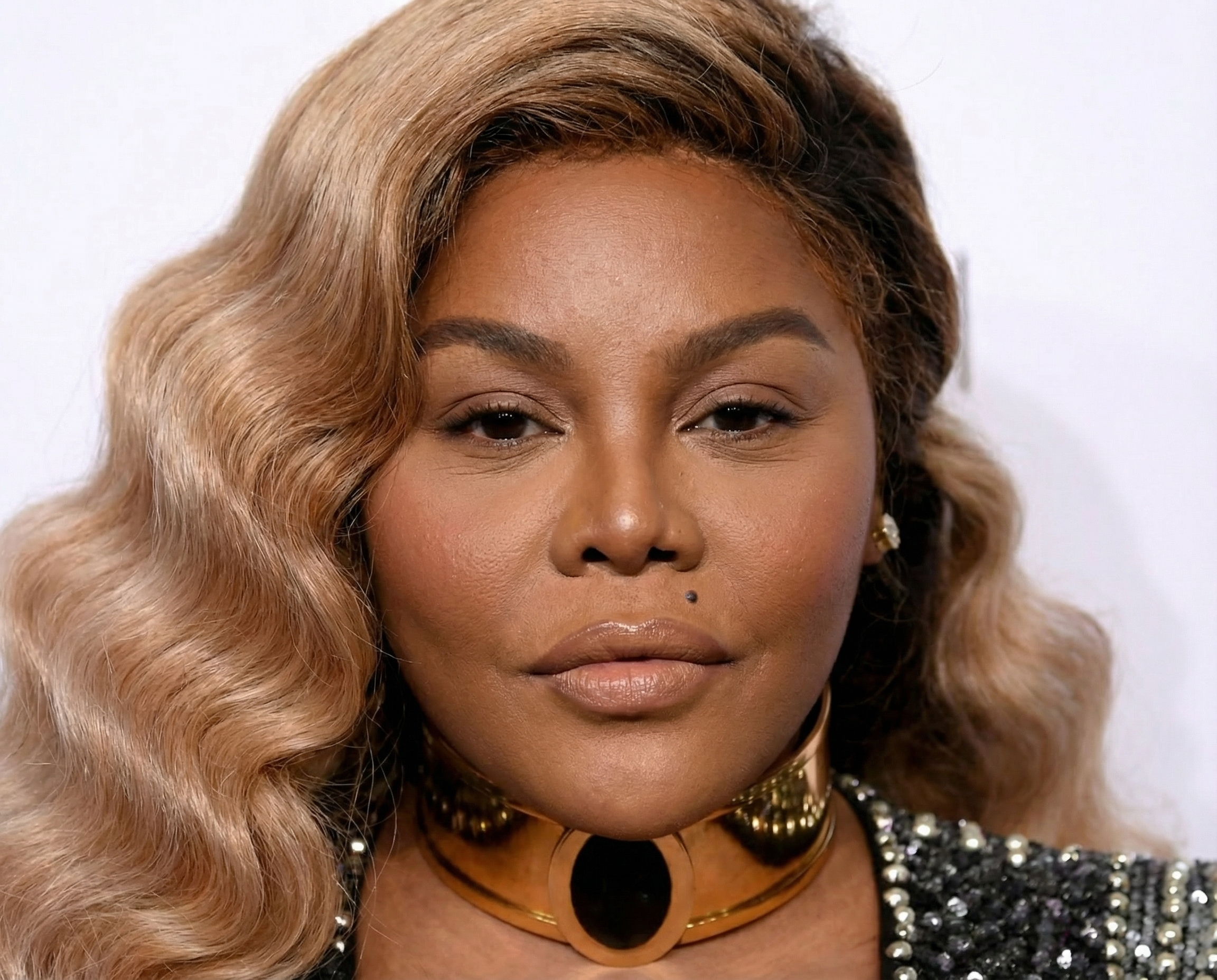 What Lil' Kim may have possibly looked like without her surgeries, according to AI. | Source: Nano Banana Pro