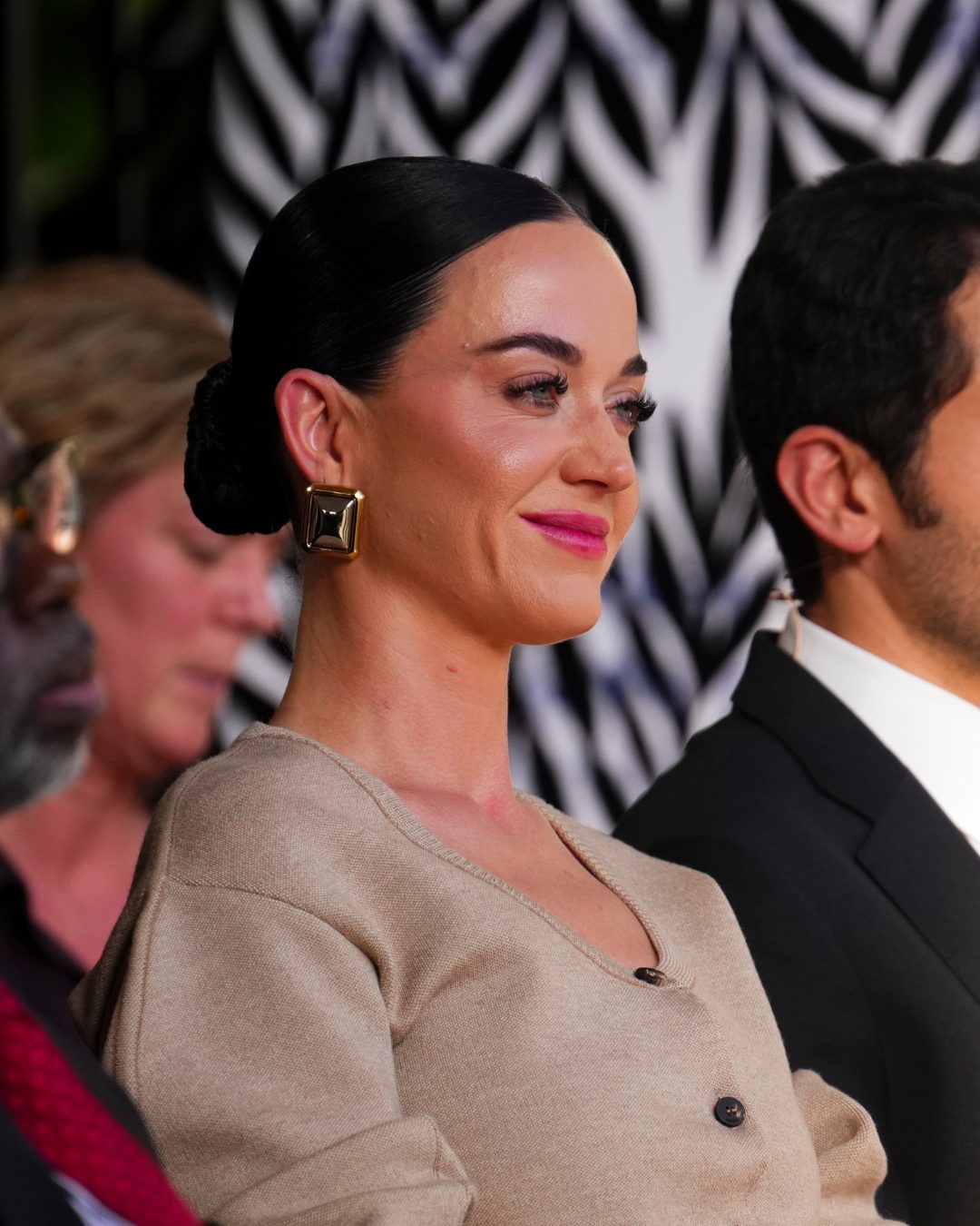 Katy Perry seated during a session at the World Economic Forum in Davos on January 20, 2026 | Source: Instagram/pagesix